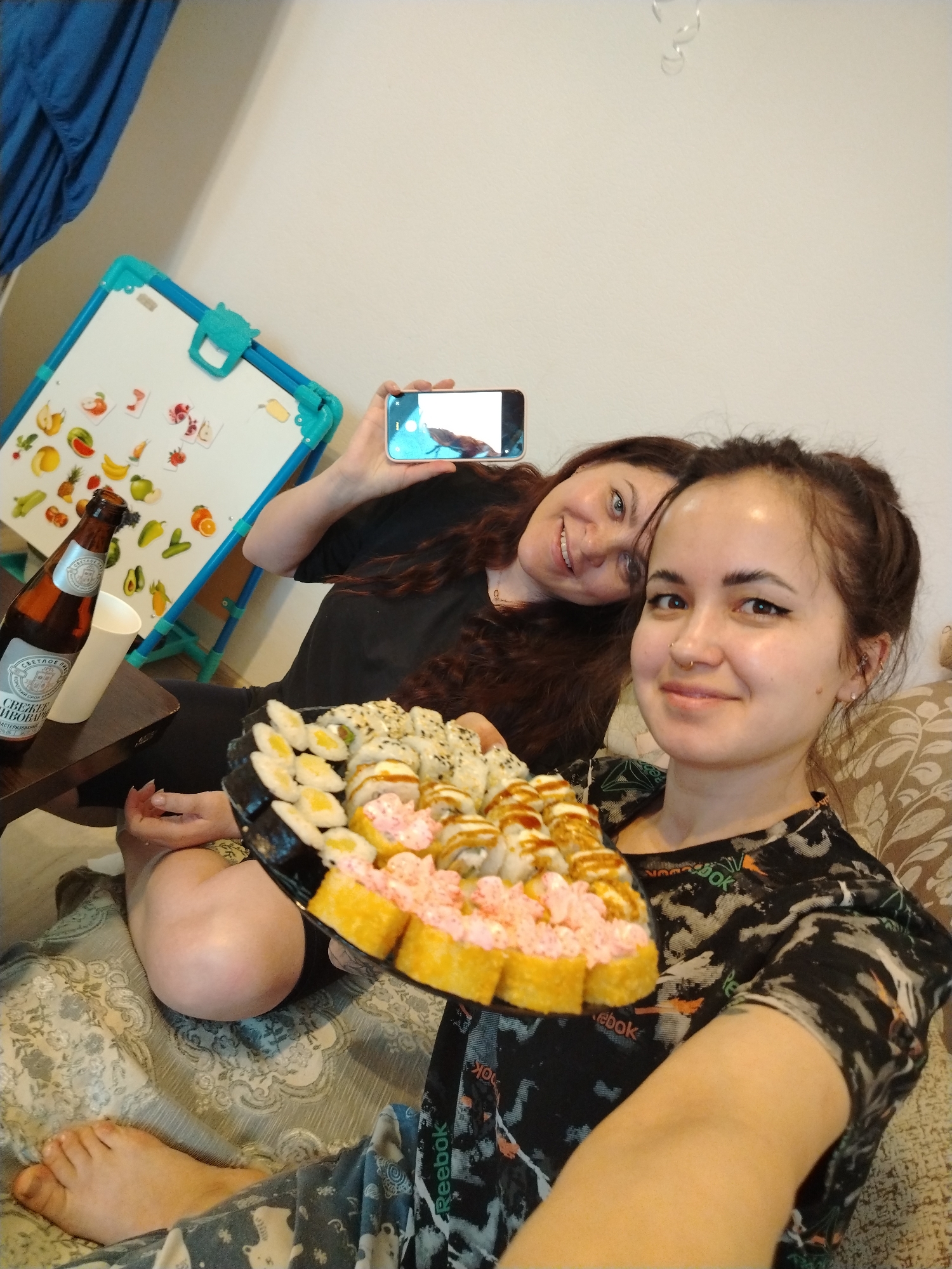 Women documented in separate indoor scenes with food, art