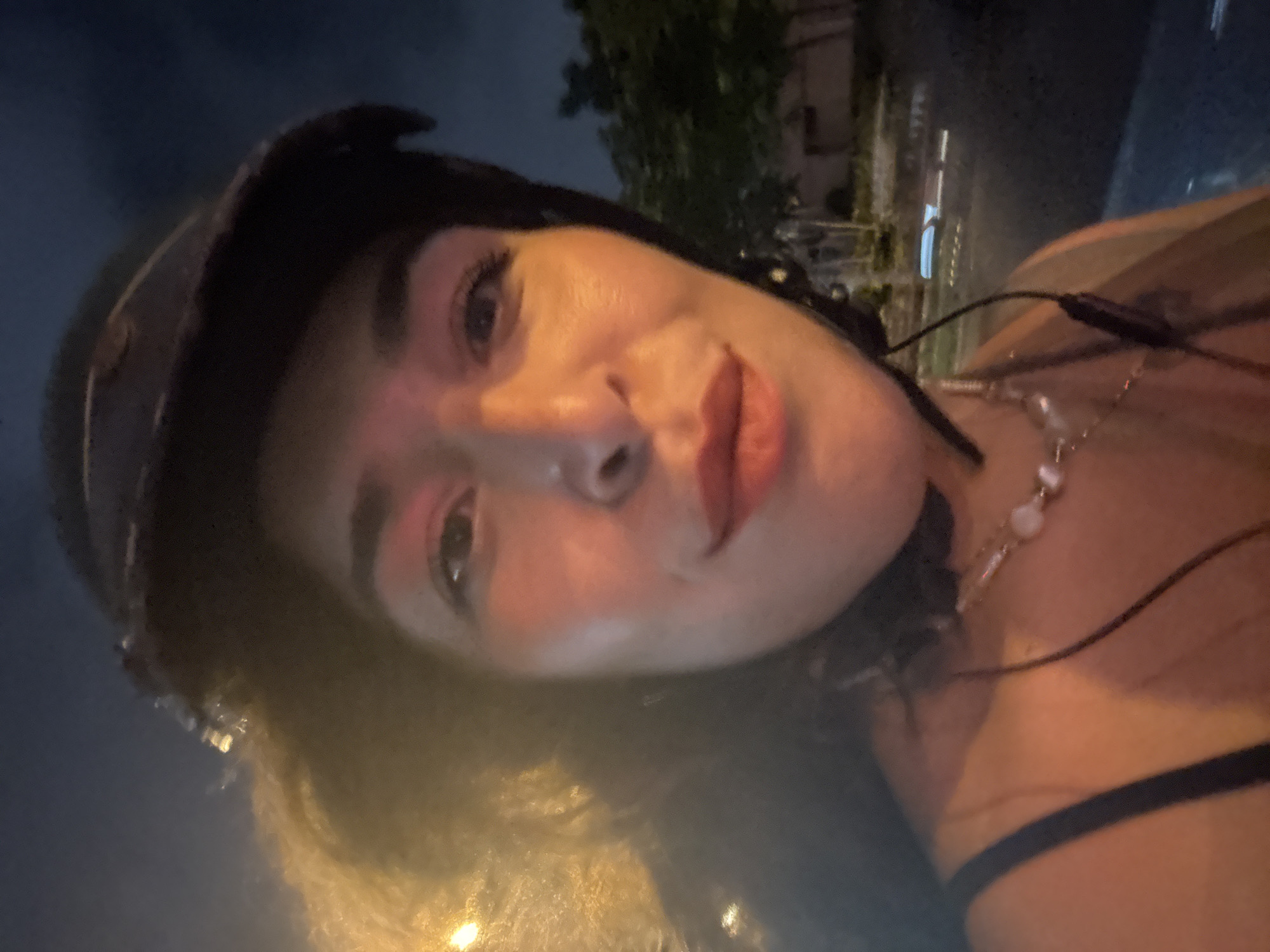 Nighttime motorcycle selfie in Thủ Đức, Vietnam