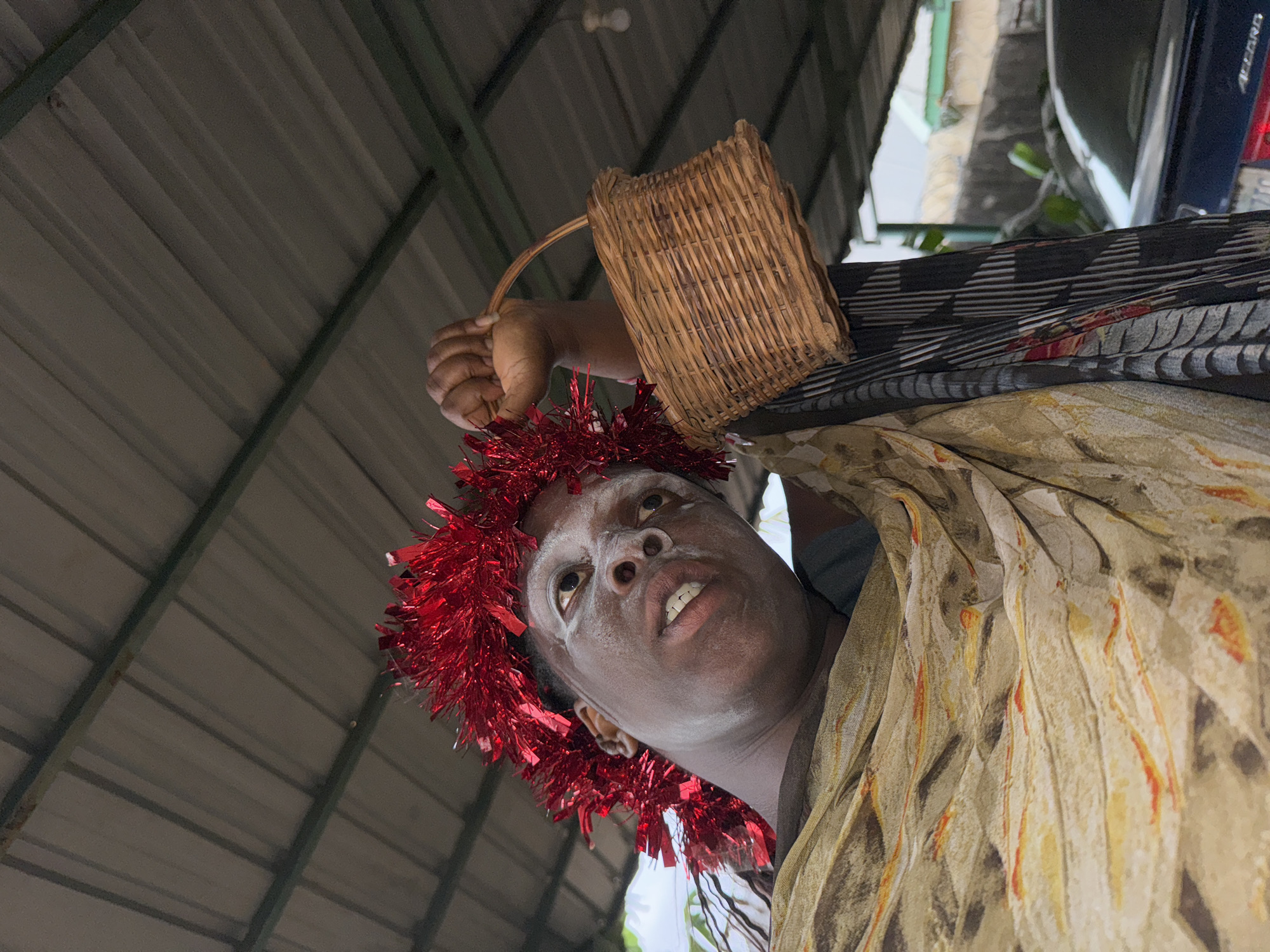 Person in ceremonial dress documented across Sabon Tasha, Nigeria