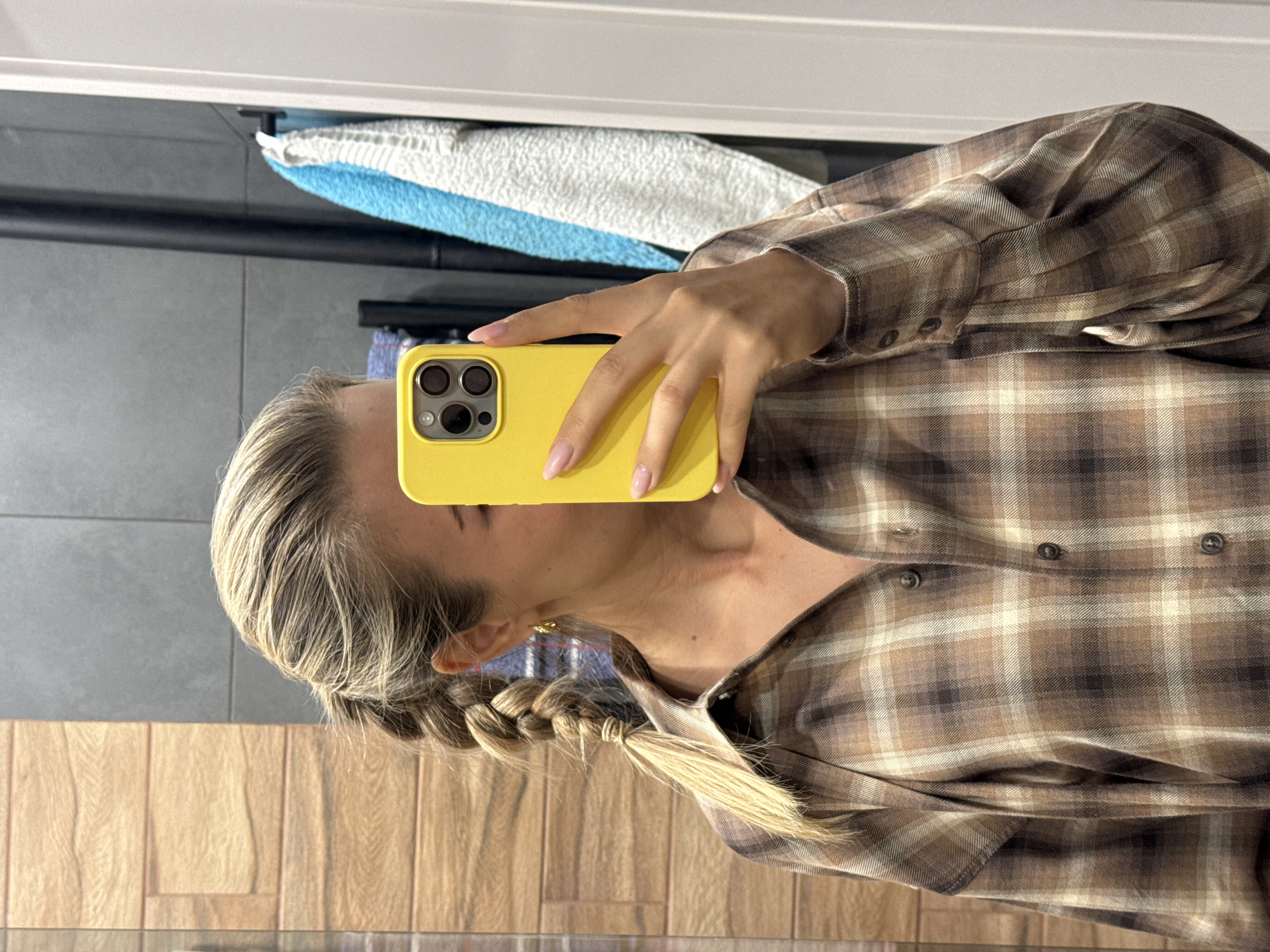 Woman in plaid shirt captured in casual moments
