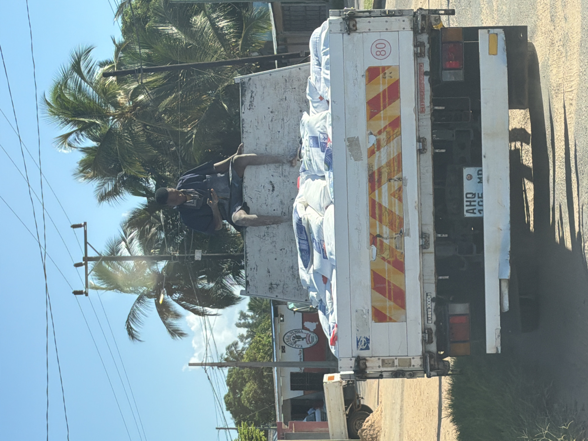 East African village street life documented during afternoon hours