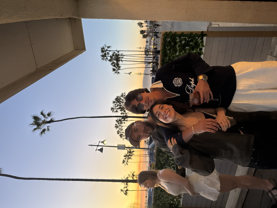 Sunset gathering draws crowd under palm trees in Los Angeles