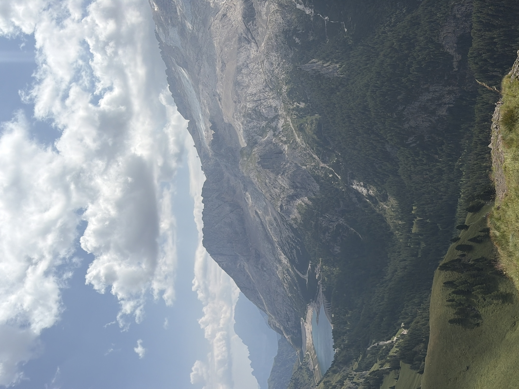 Hiking the Dolomites above Canazei on a sunny August morning