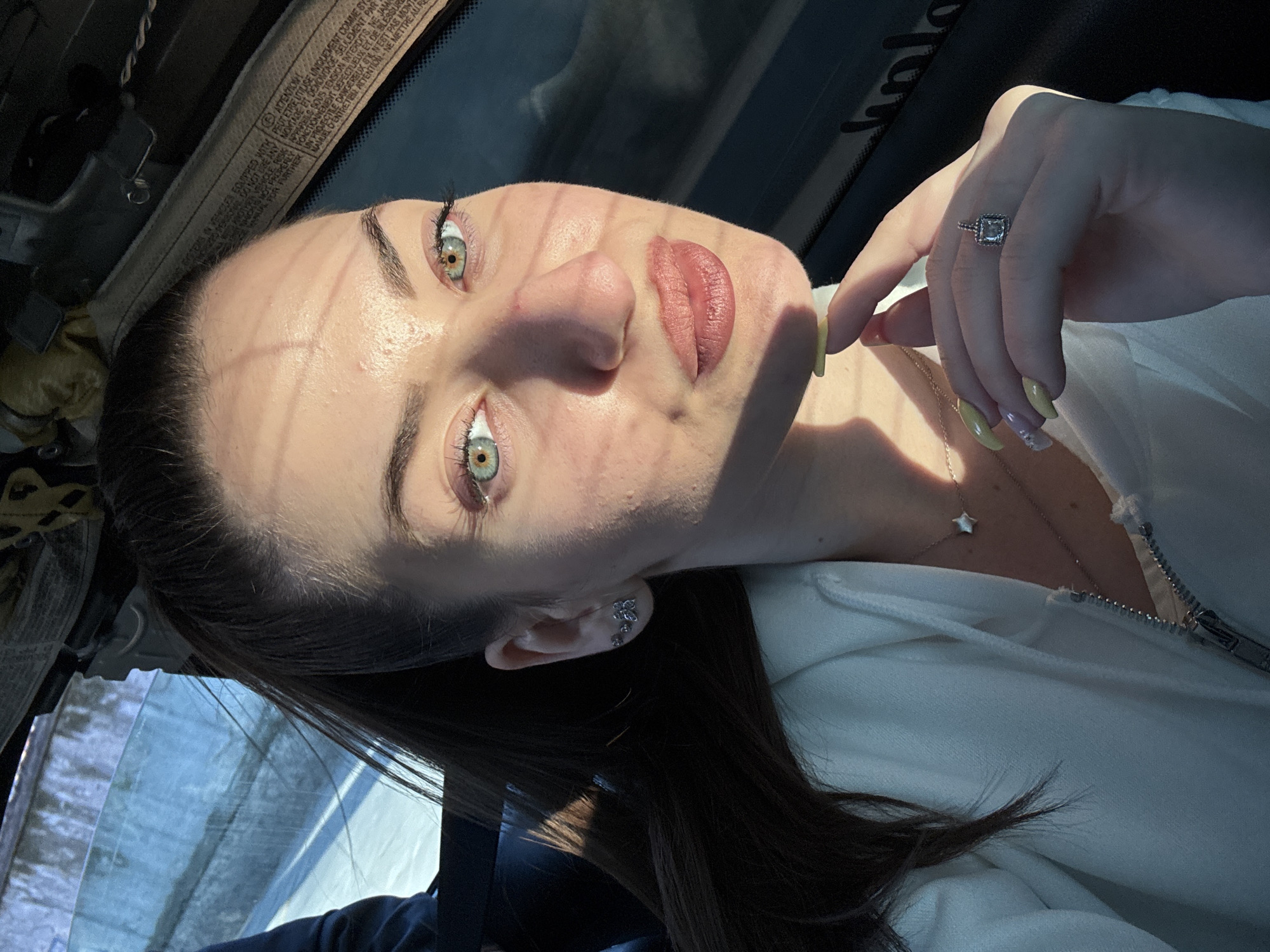 Woman takes selfie in vehicle in Plovdiv, Bulgaria