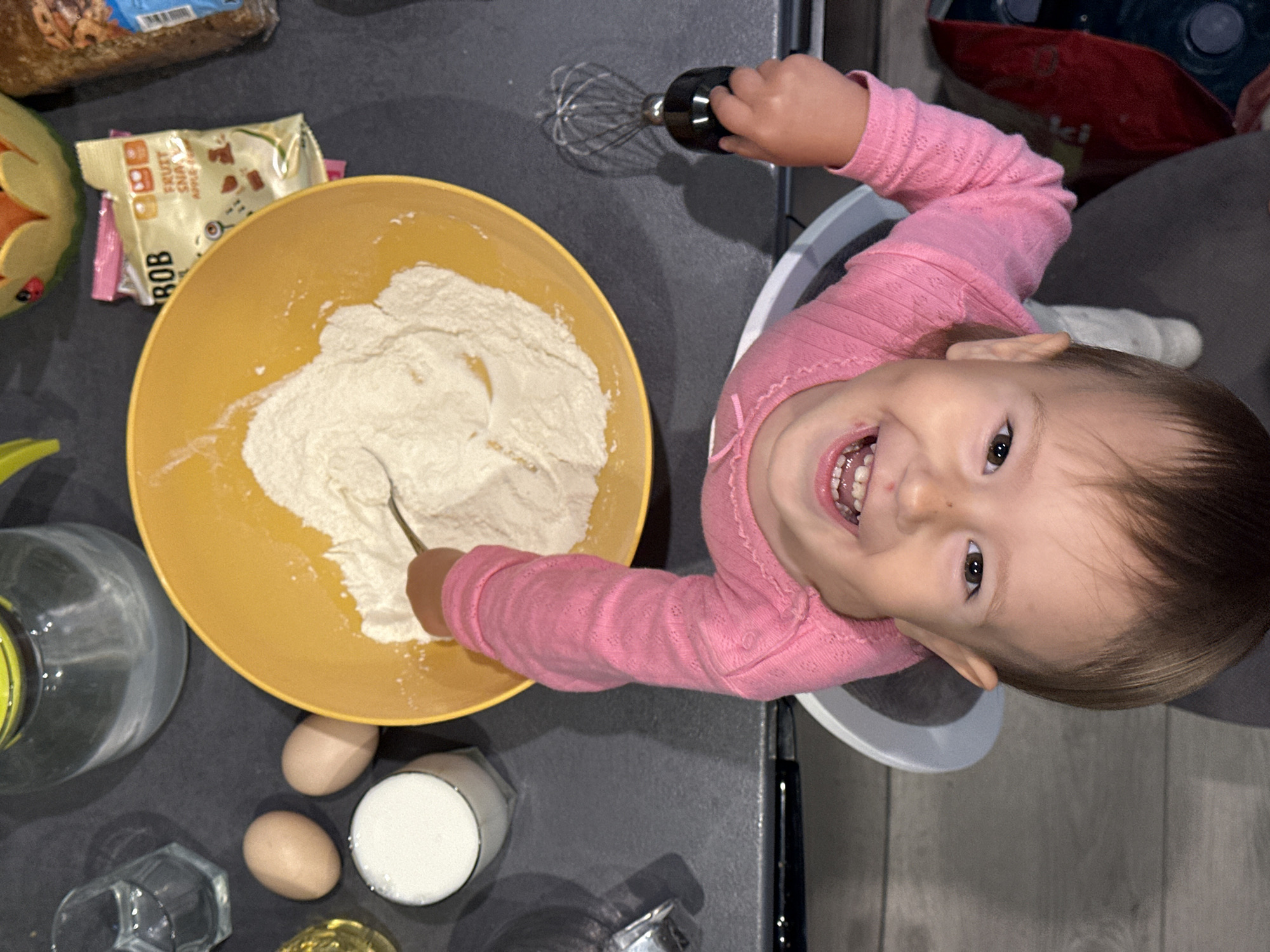 Child enjoys baking activity in Wisła, Poland