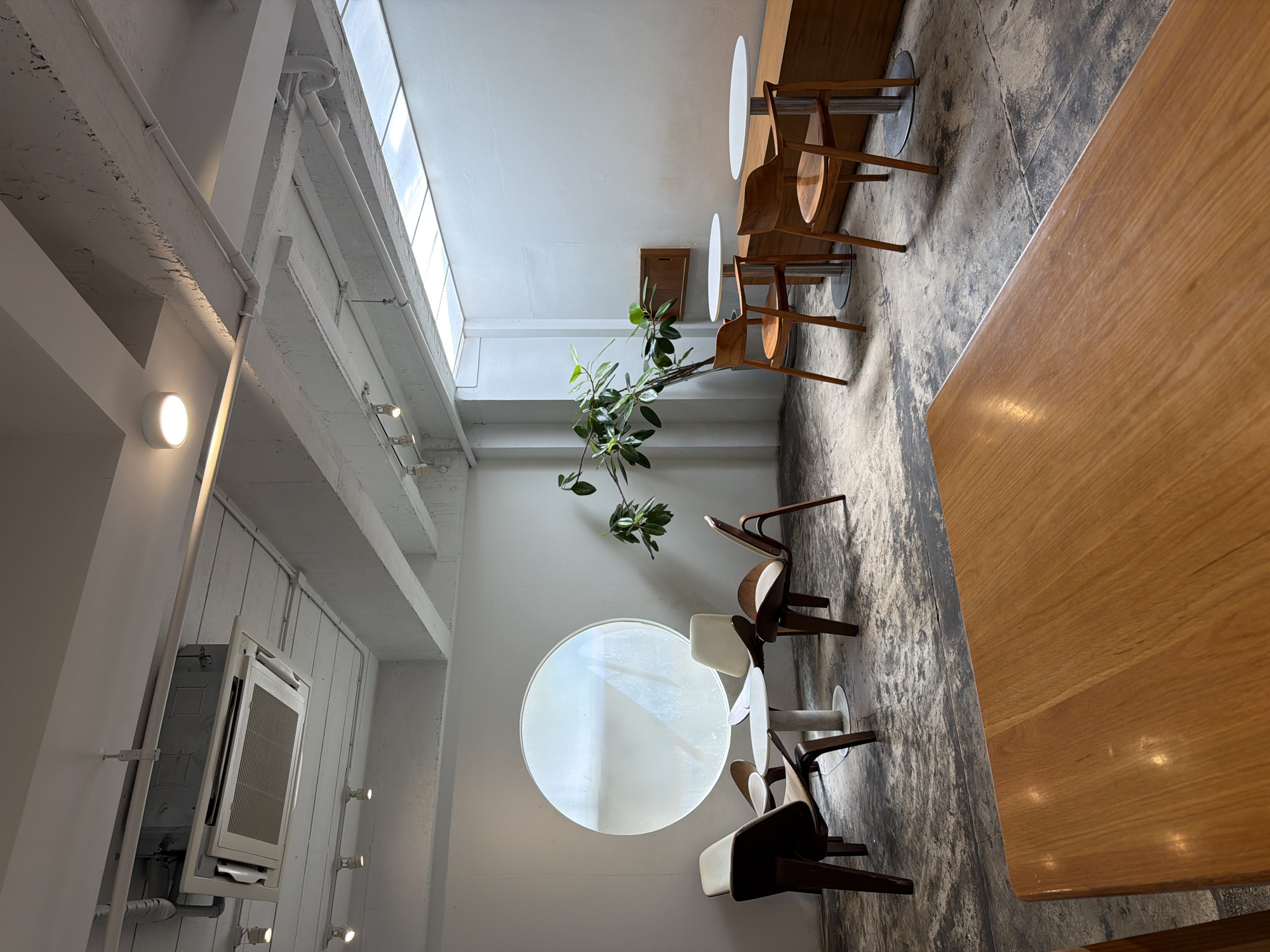 Quiet morning at a minimalist cafe with drinks in focus