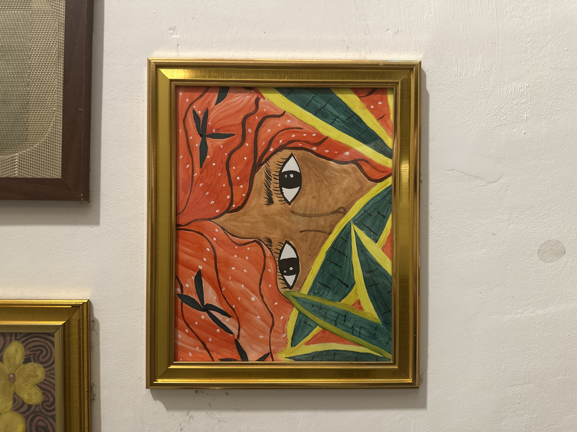 Person documents personal belongings, artwork in Davao City home