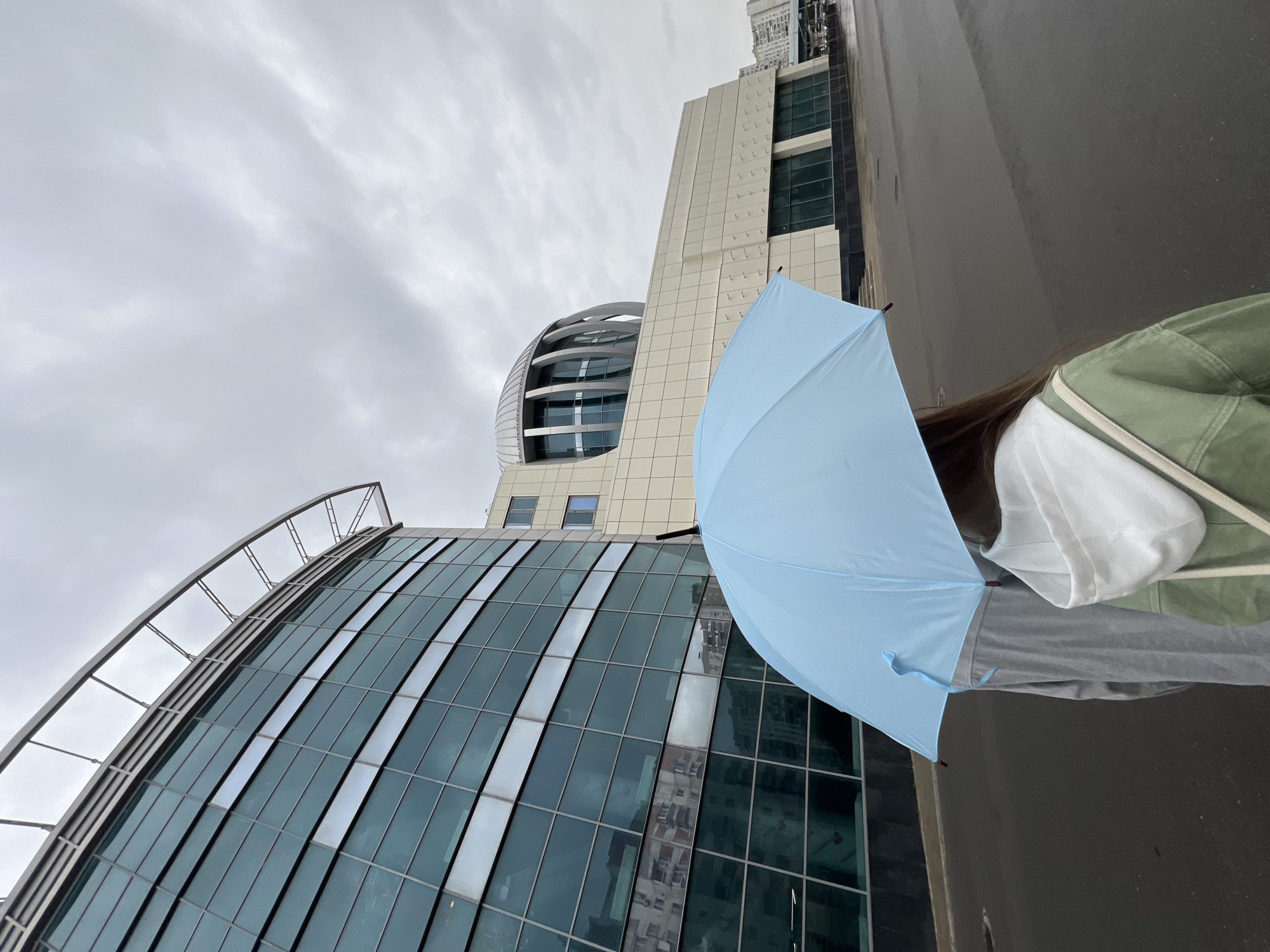 Rainy day stroll near a modern Moscow complex