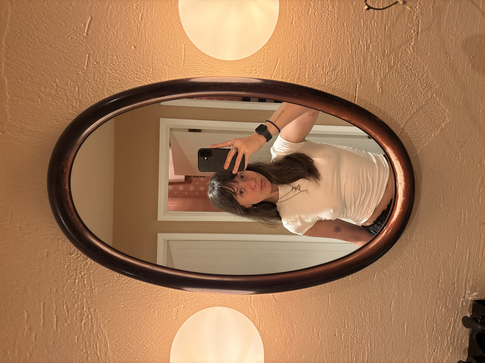 Woman takes mirror selfie in London