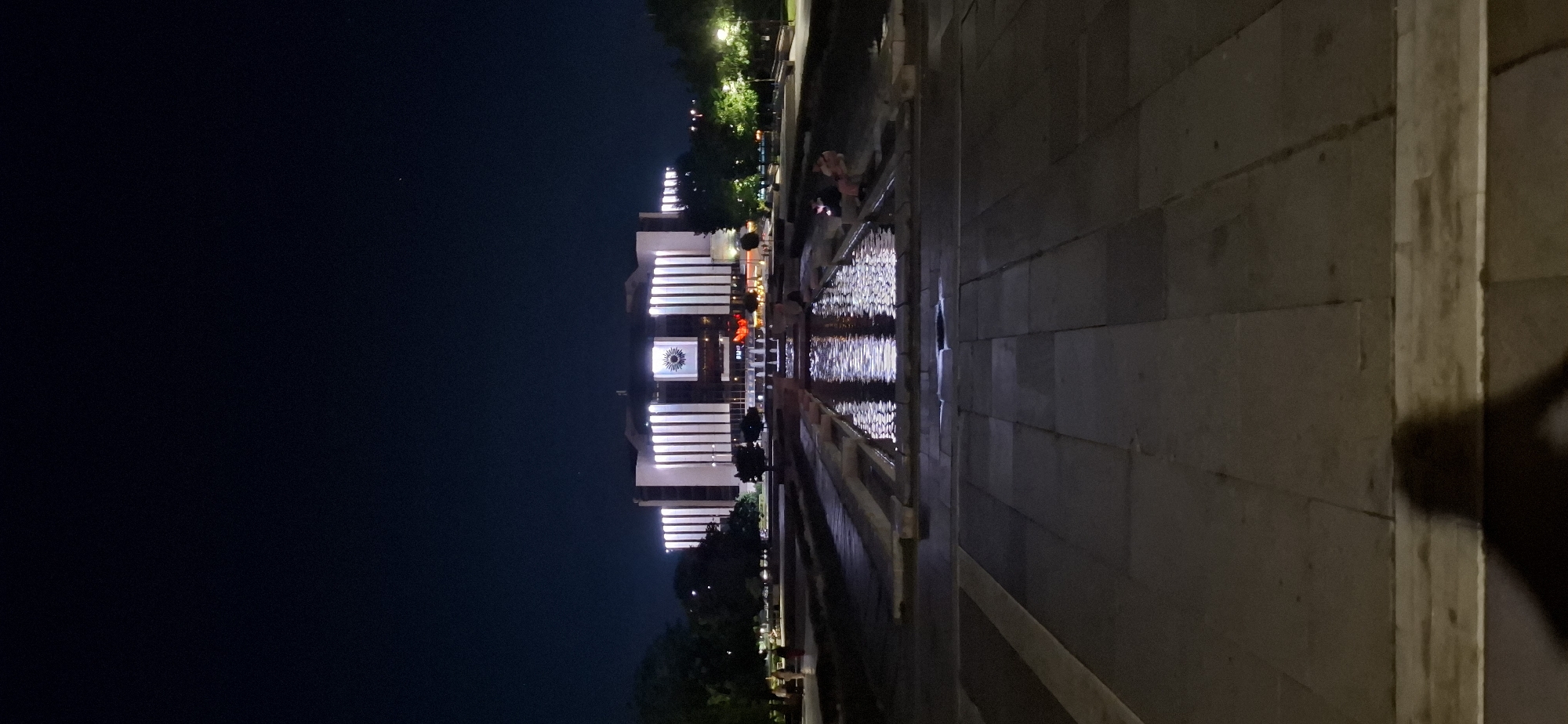 Sofia's National Palace of Culture glowing after dark