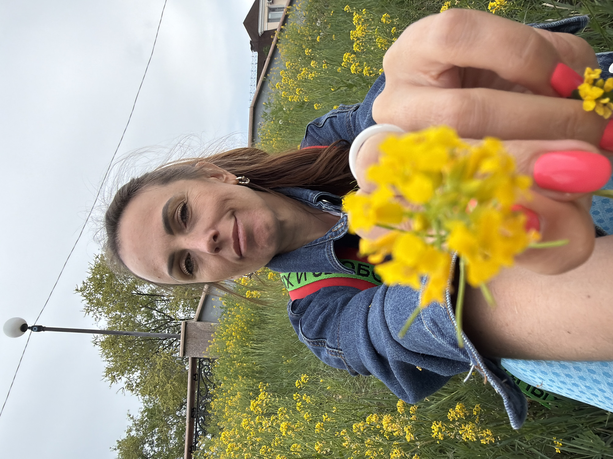 Women photographed in wildflower field in Birobidzhan, Russia