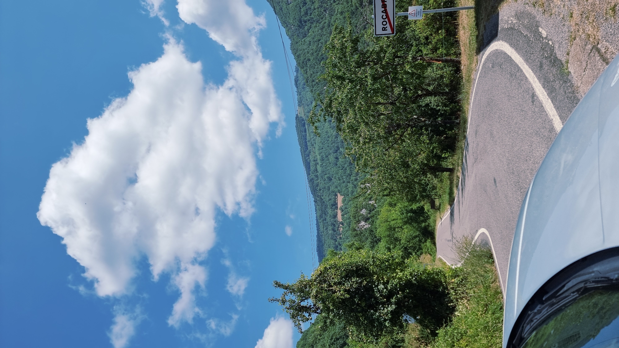 Winding road through green mountain terrain near Camprodon, Spain