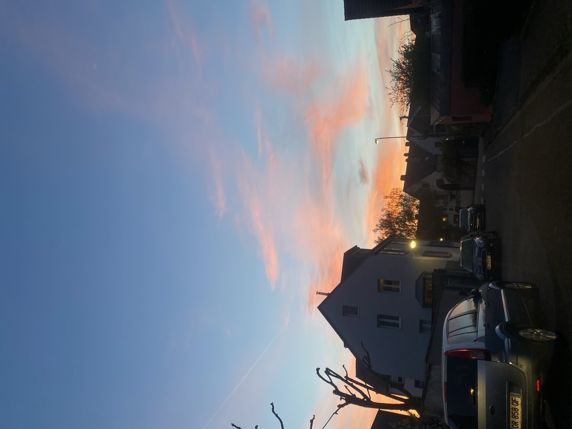 Dusk sky displays color transition over Strasbourg streets