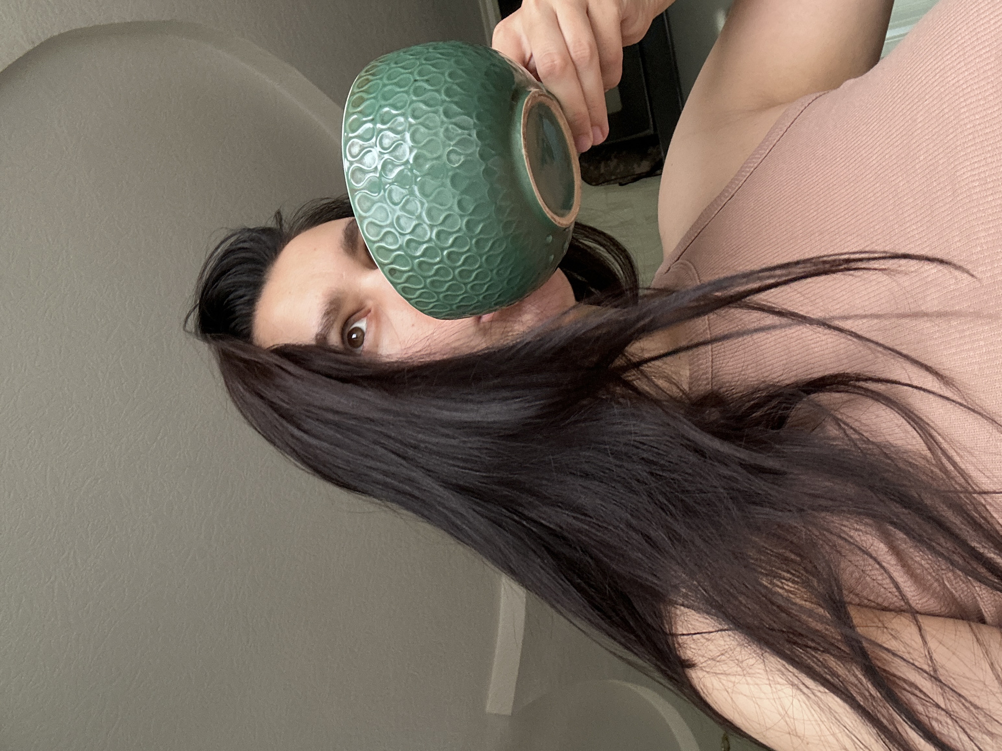 Woman drinks from green bowl in Chaikovsky morning scene