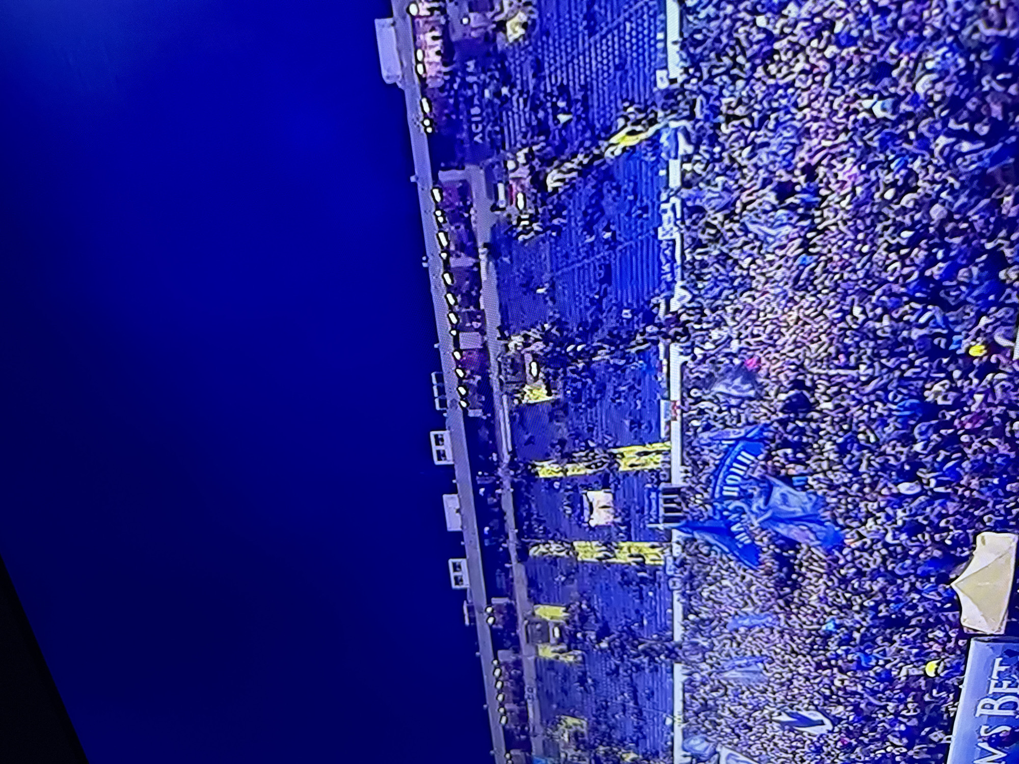 Blue-clad crowd fills Berkovitsa stadium during sporting event