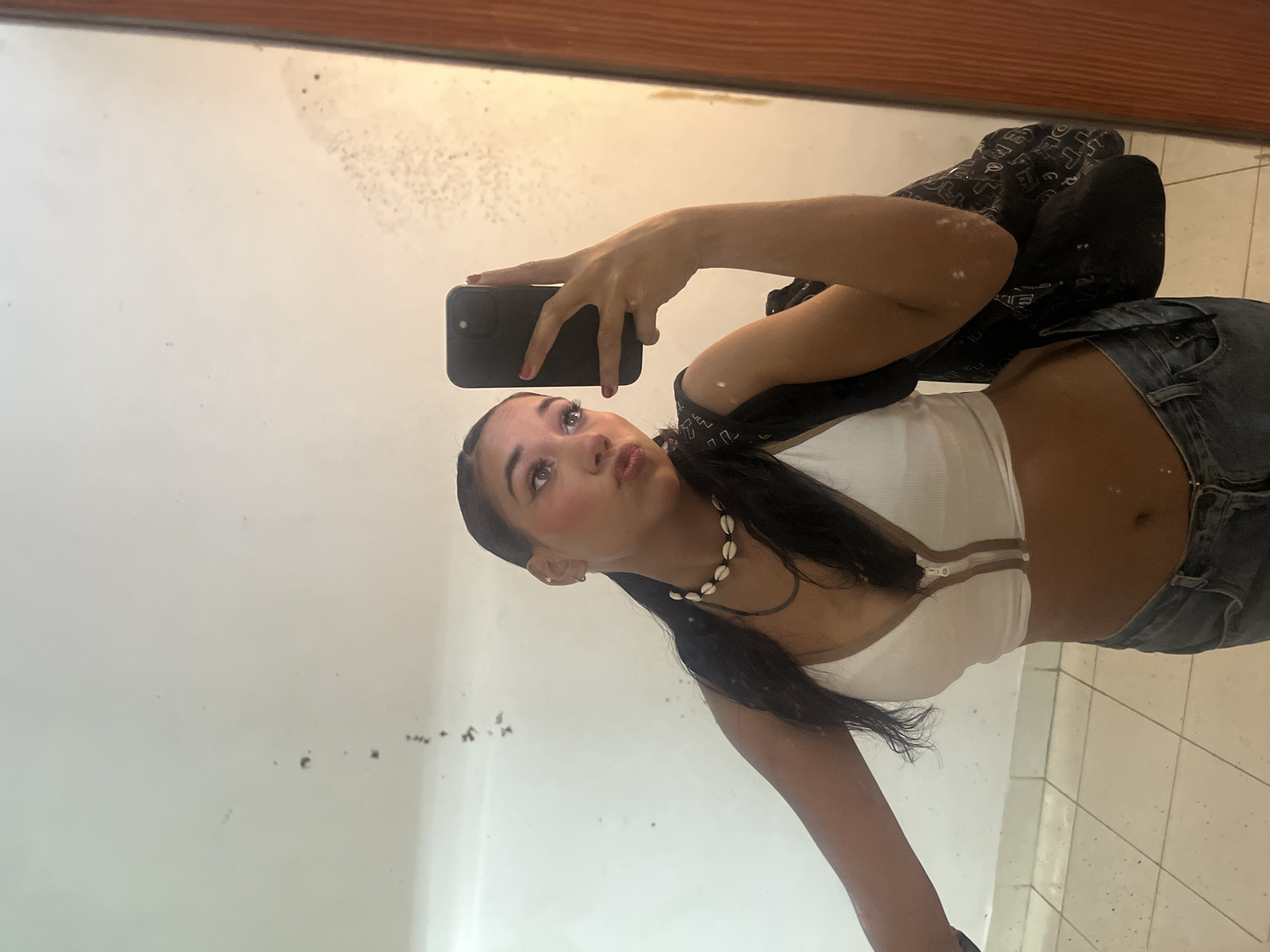 Mirror selfies and a collectibles shop in Pampatar, Venezuela