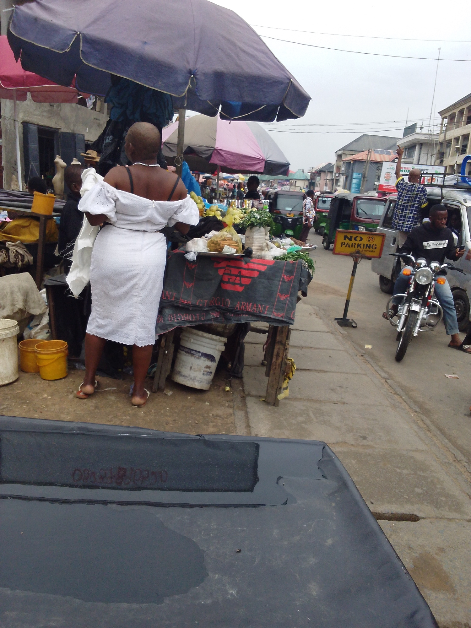 Everyday street life documented in Aba, Nigeria commercial district