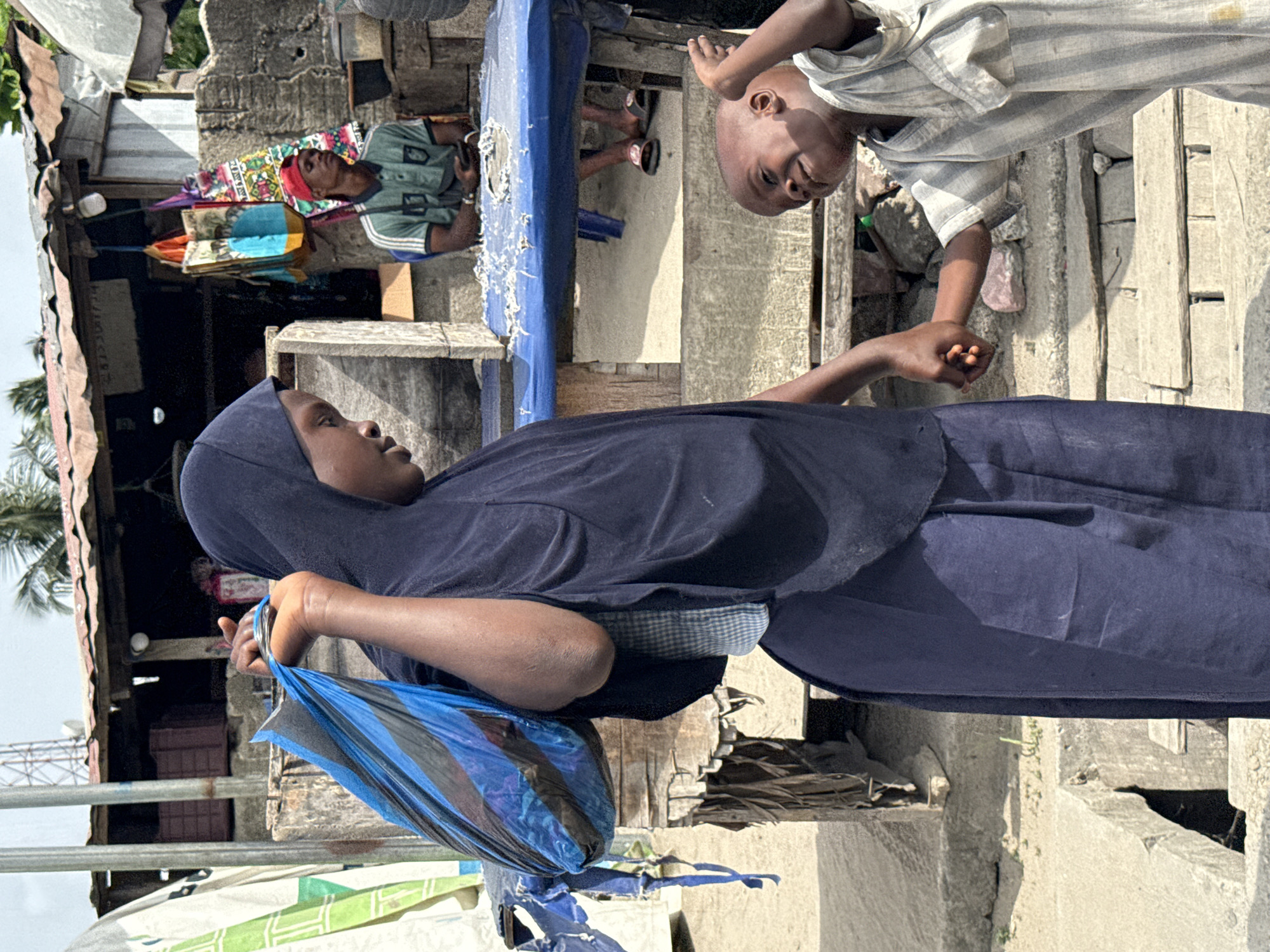 Daily commerce and community interactions observed in Ado, Nigeria