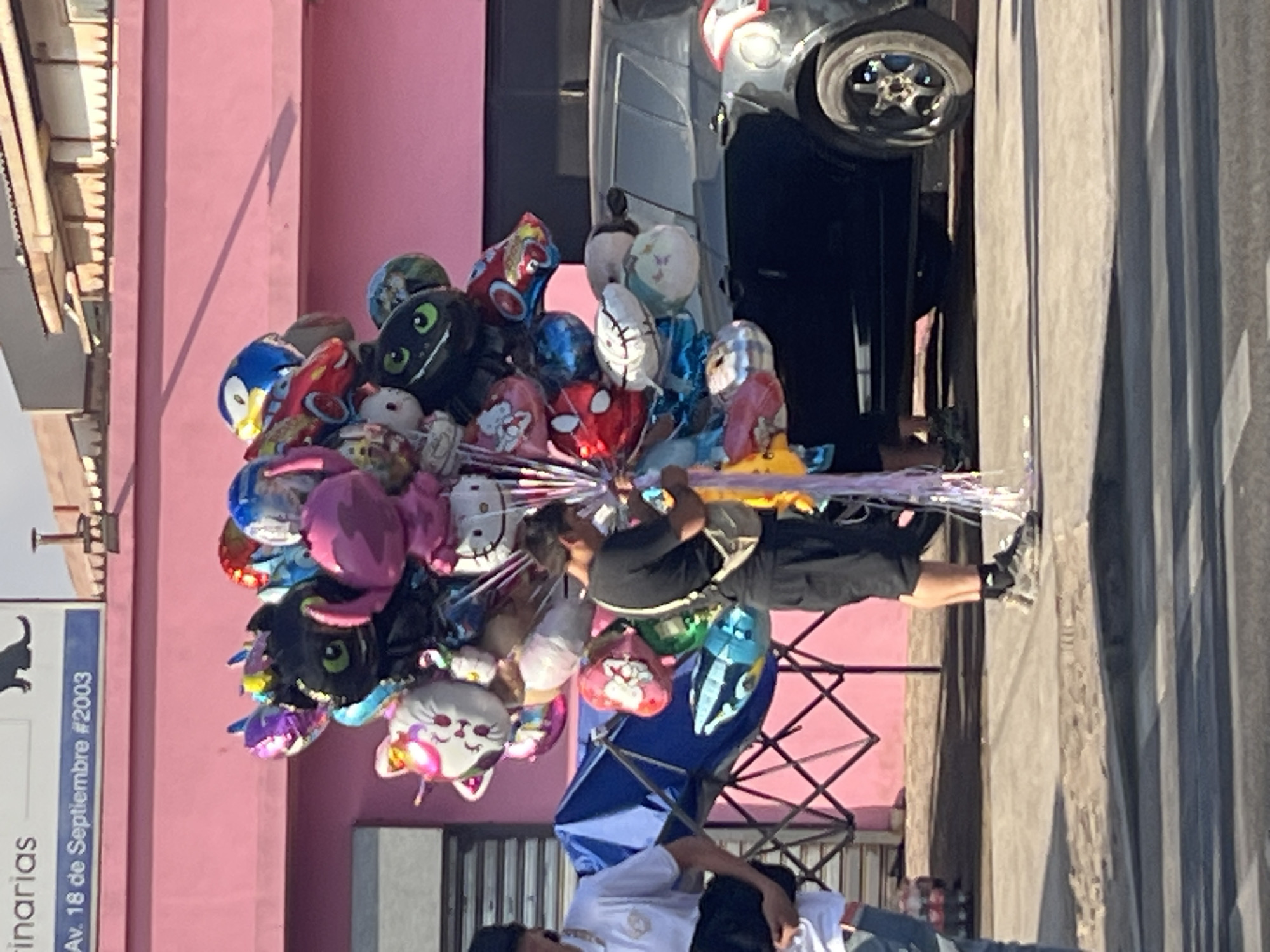 Street scenes near a stadium in Arica on a summer evening