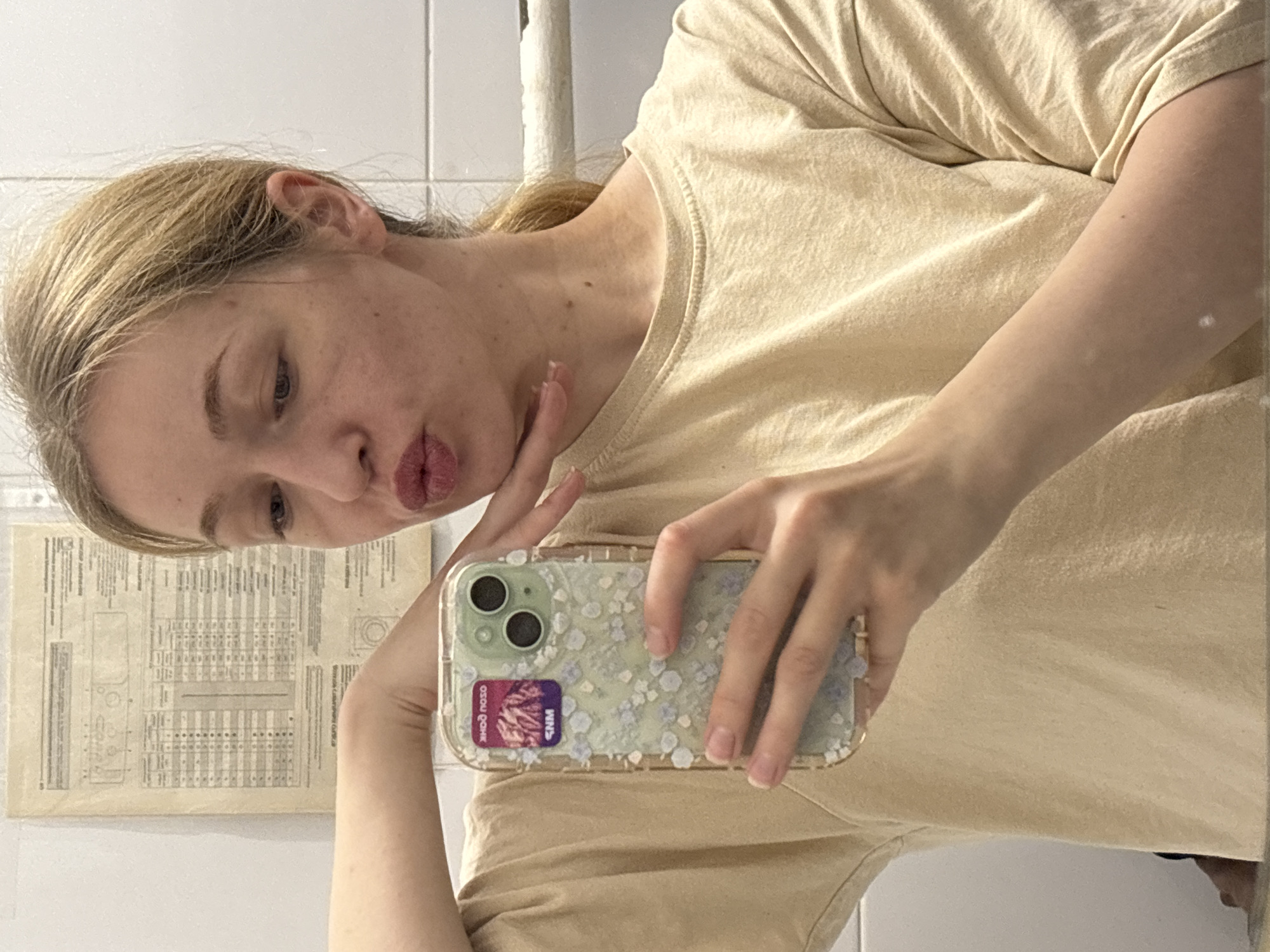 Bathroom selfies and sunny birch trees in a residential courtyard