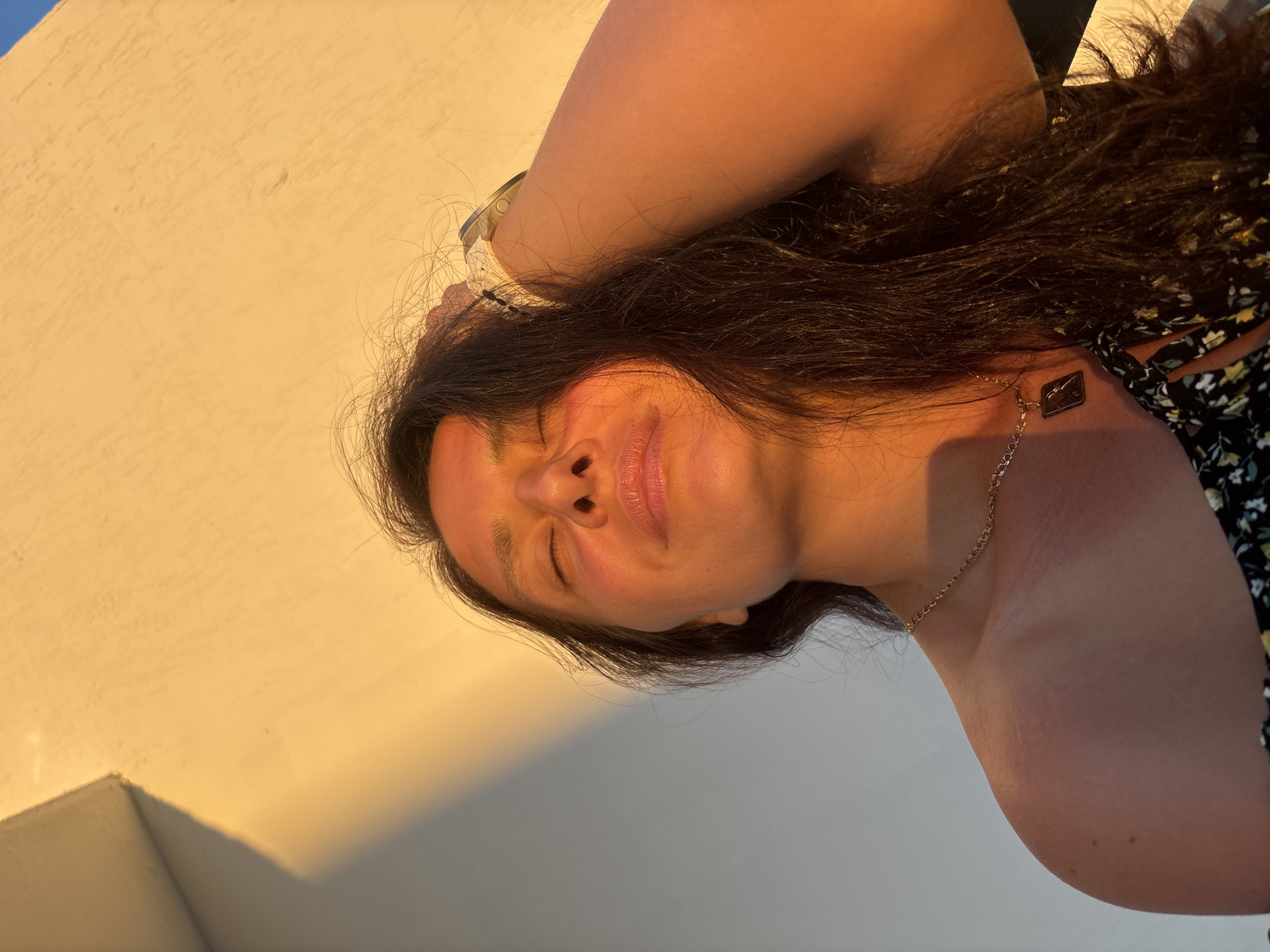 Golden-hour balcony shoot in Chaikovsky with strawberries and sunset views