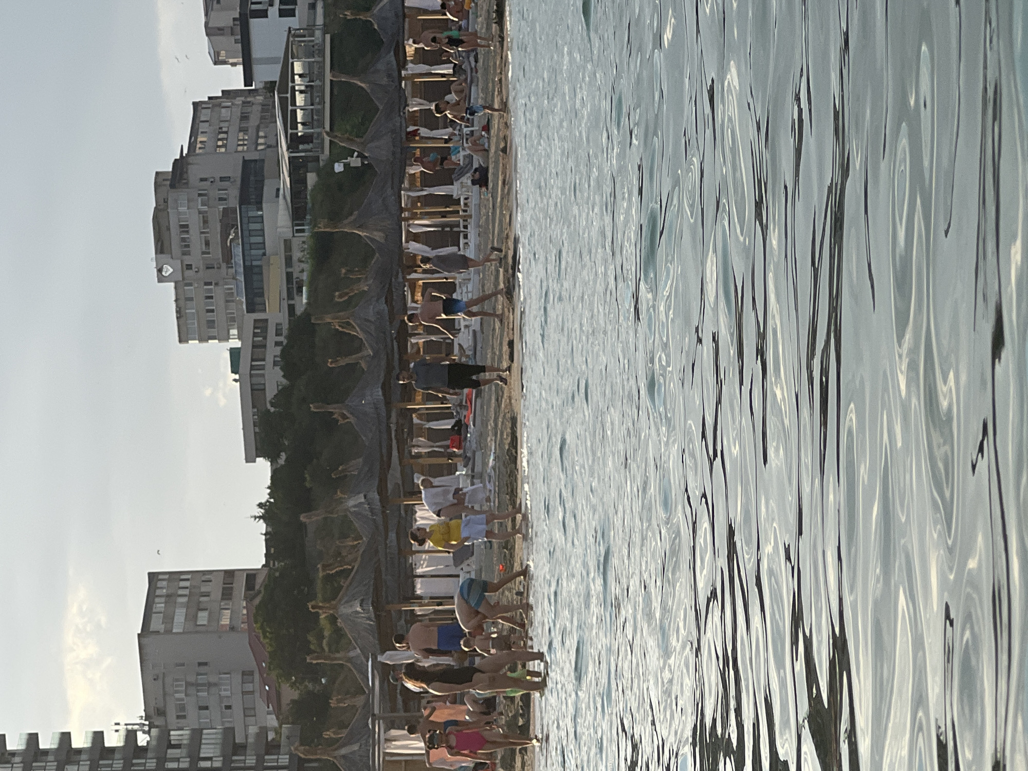 Crowded Black Sea beach in Constanța on a sunny July afternoon