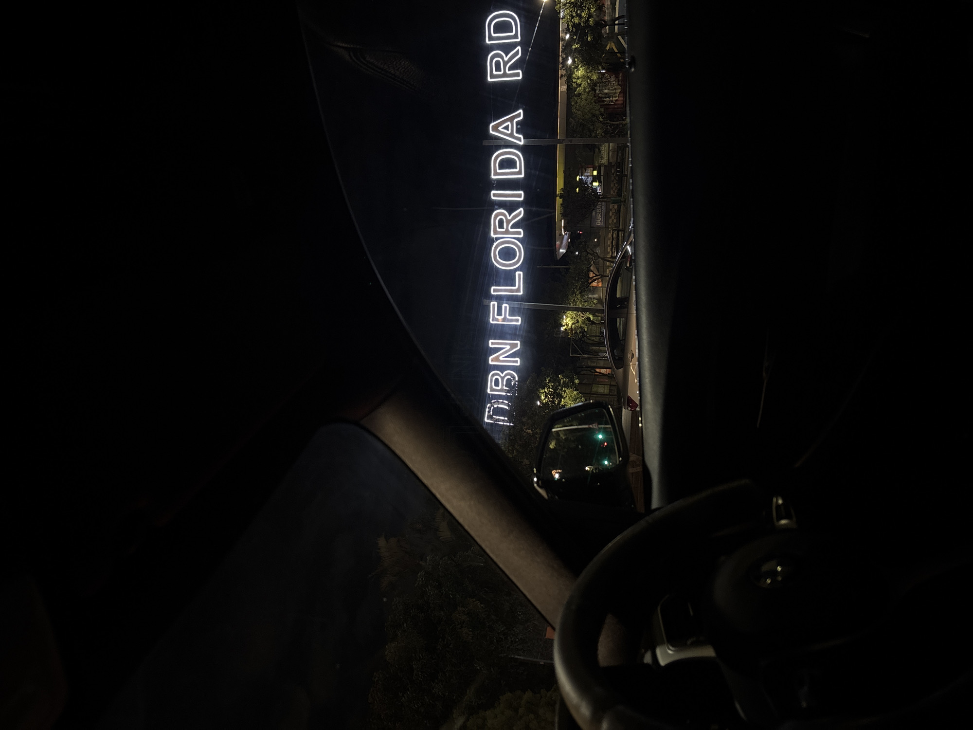 Evening drive along Durban's Florida Road captures local pizzeria