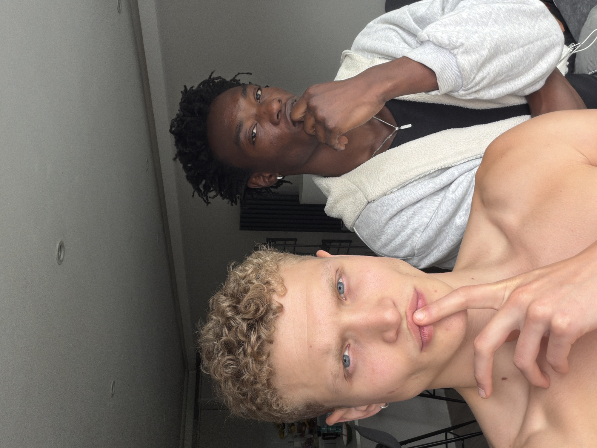 Two young men photographed in London apartment
