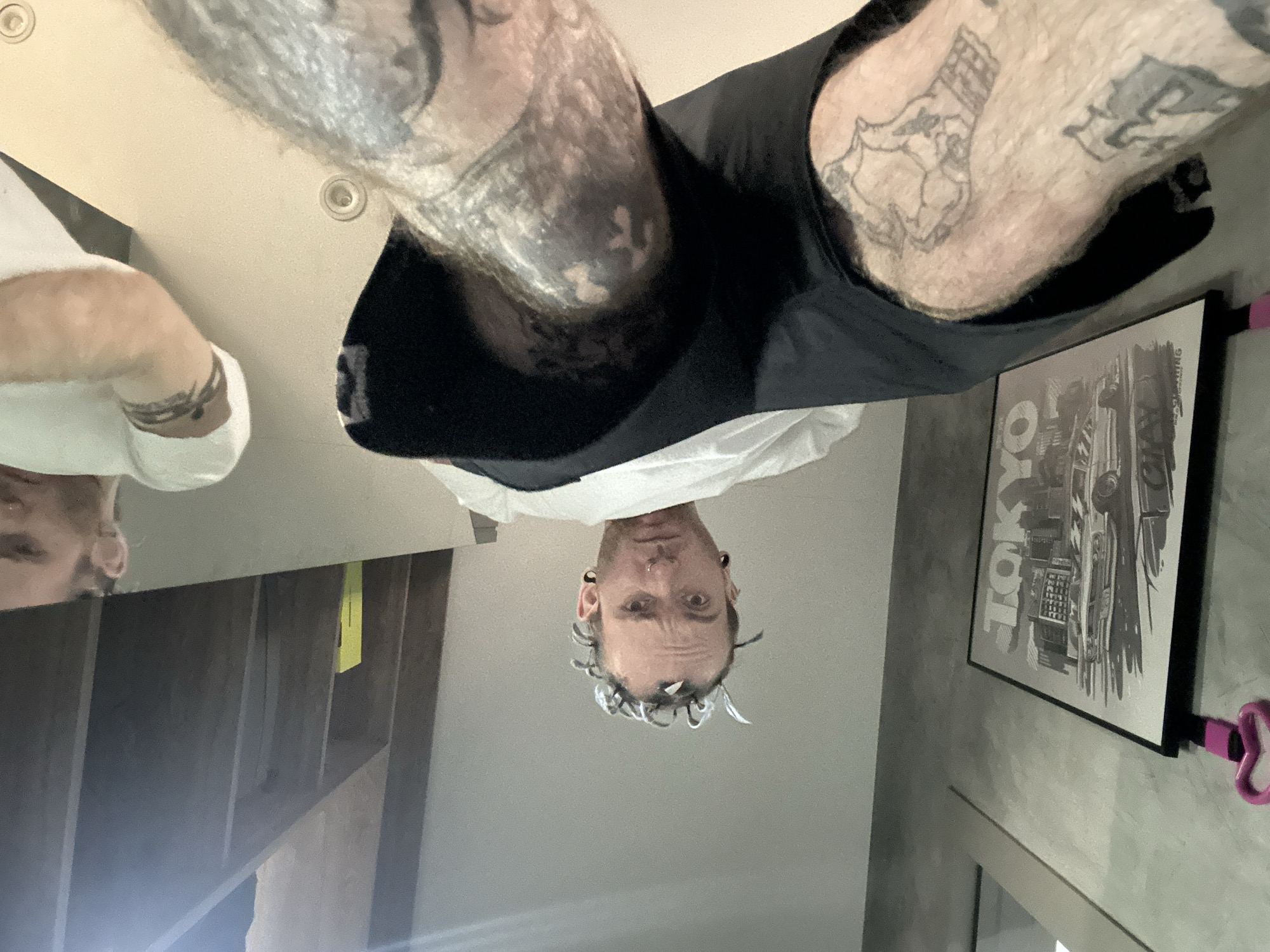 Tattooed person photographed from unusual angle in Khimki