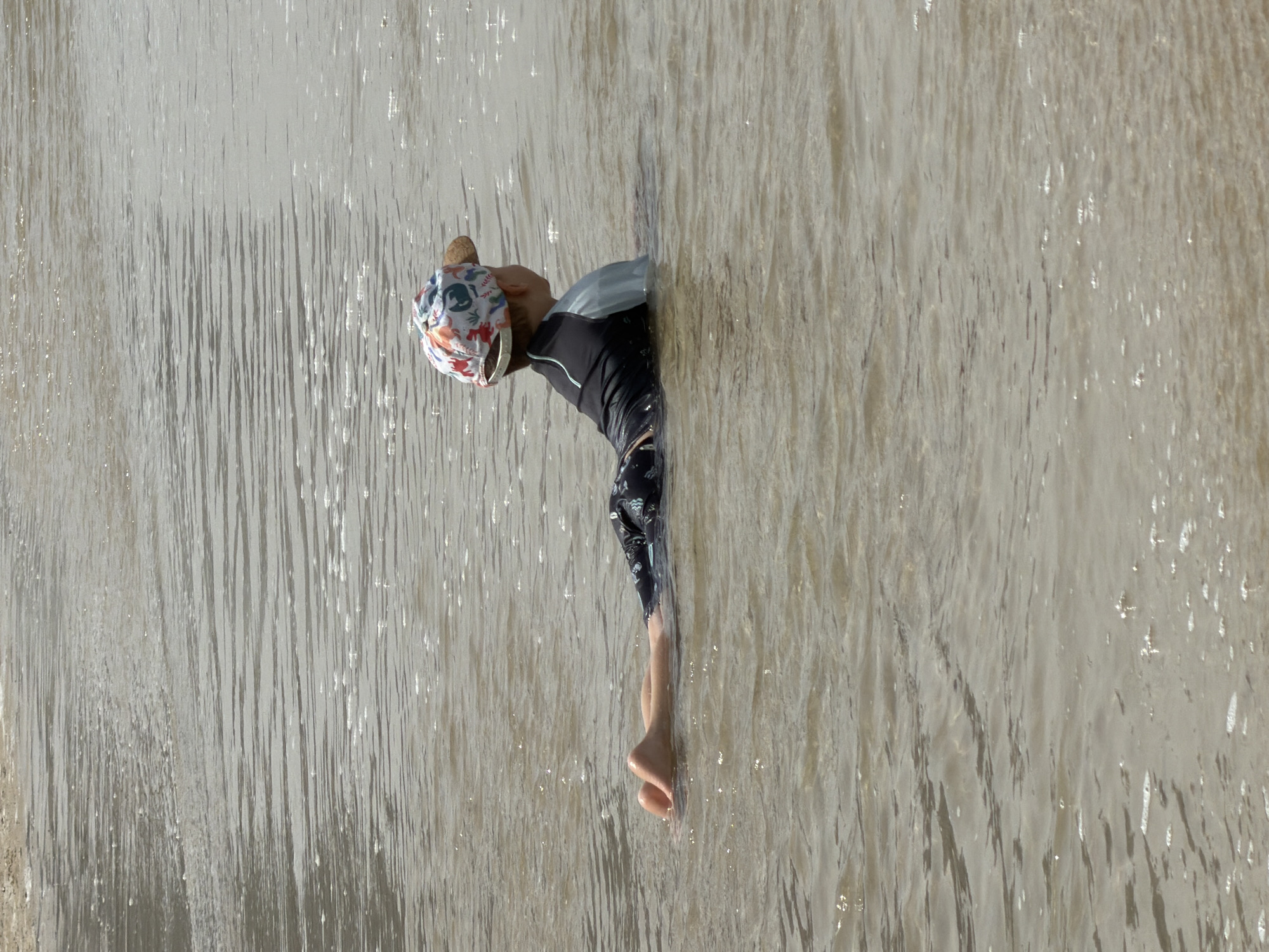 Man with trekking poles observed on Tel Aviv beach