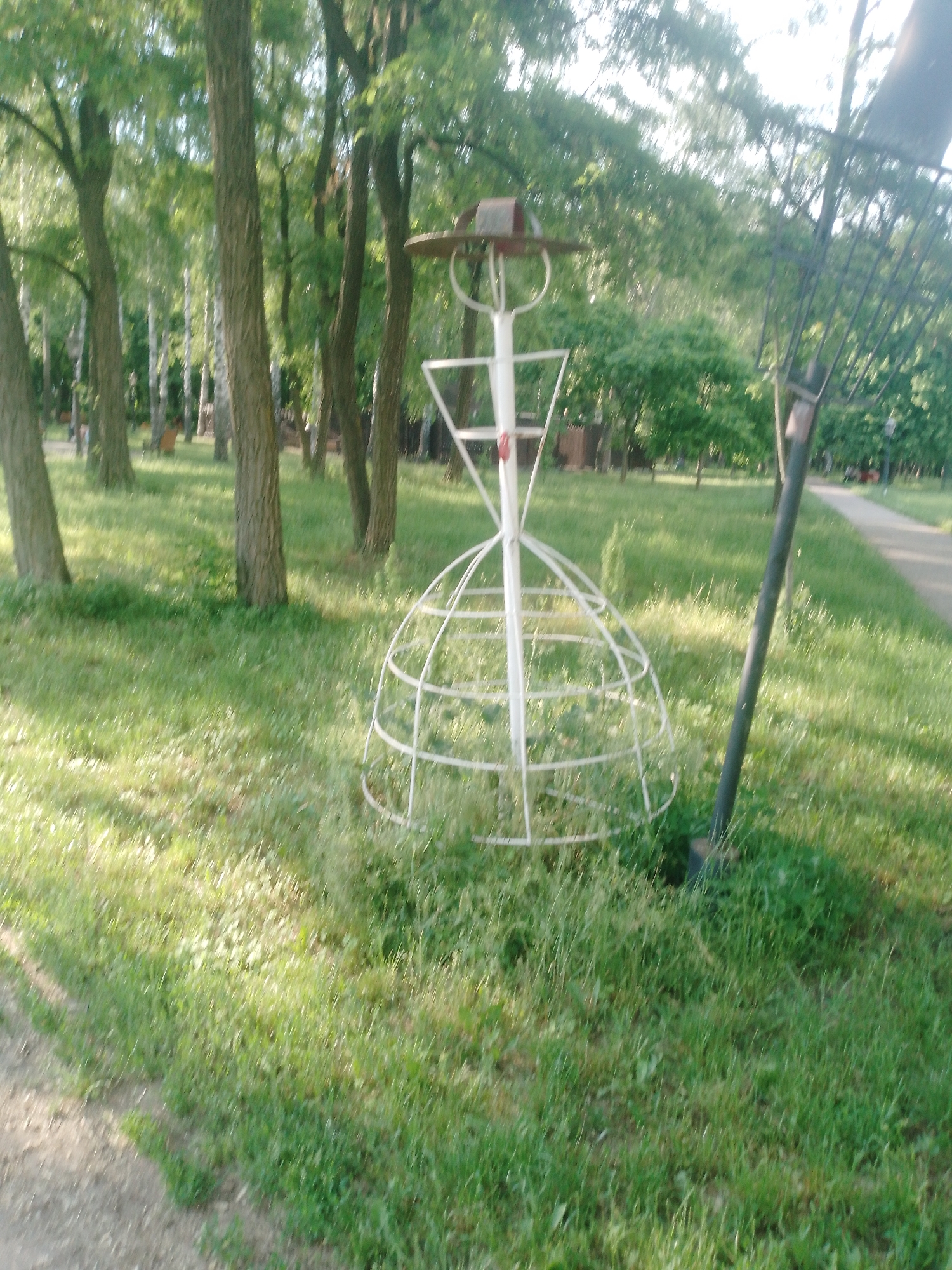 Park sculptures and pathways documented in Homyel, Belarus