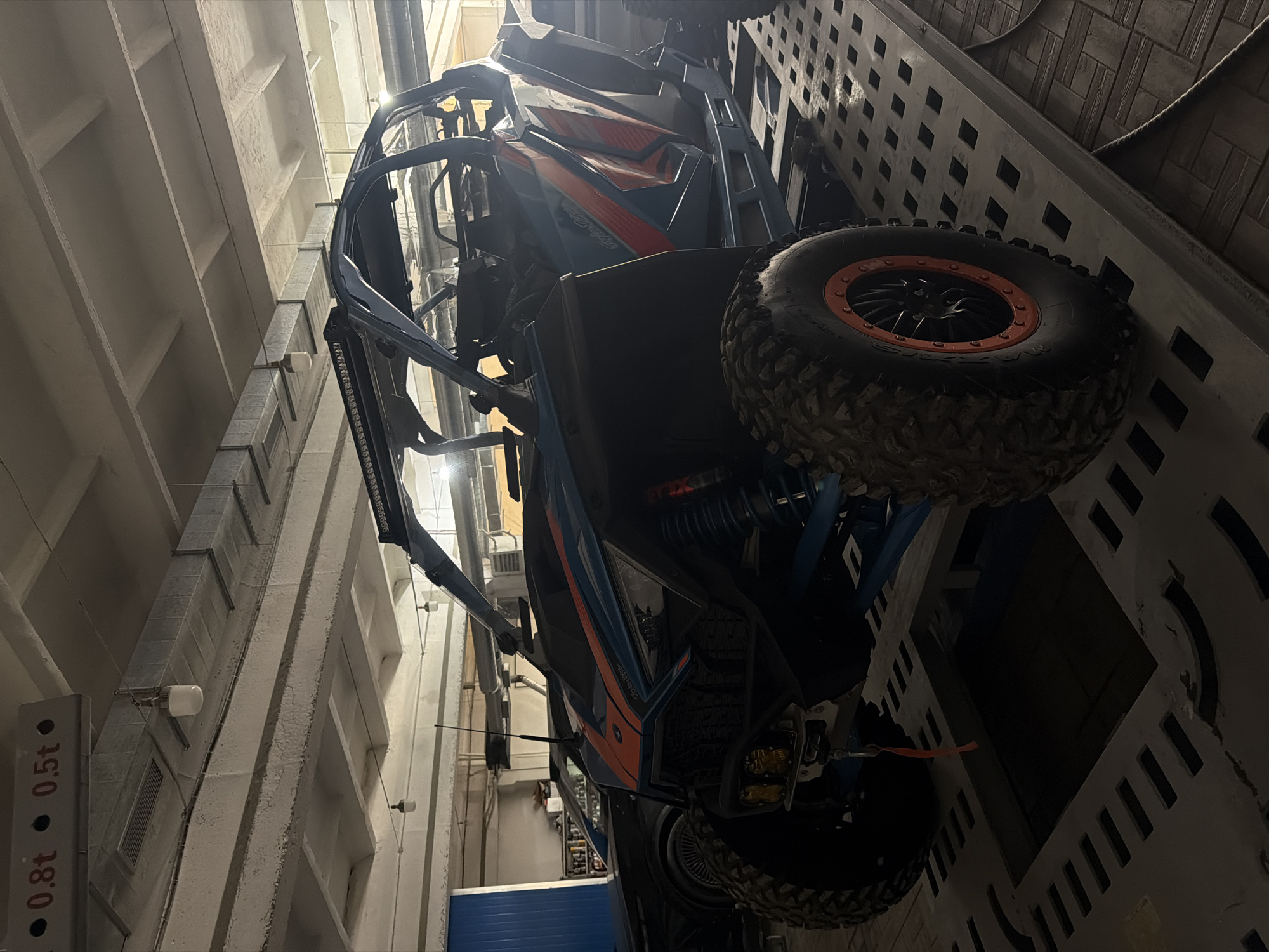 ATV and motorcycle spotted parked at indoor facility