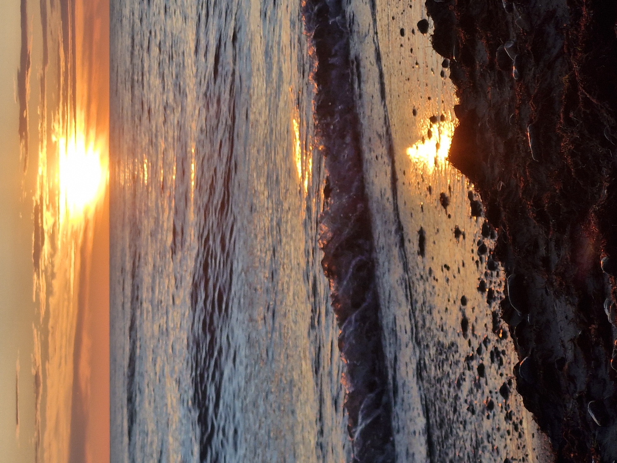 Beach sunset to dusk, waves, sea glass, and shifting skies
