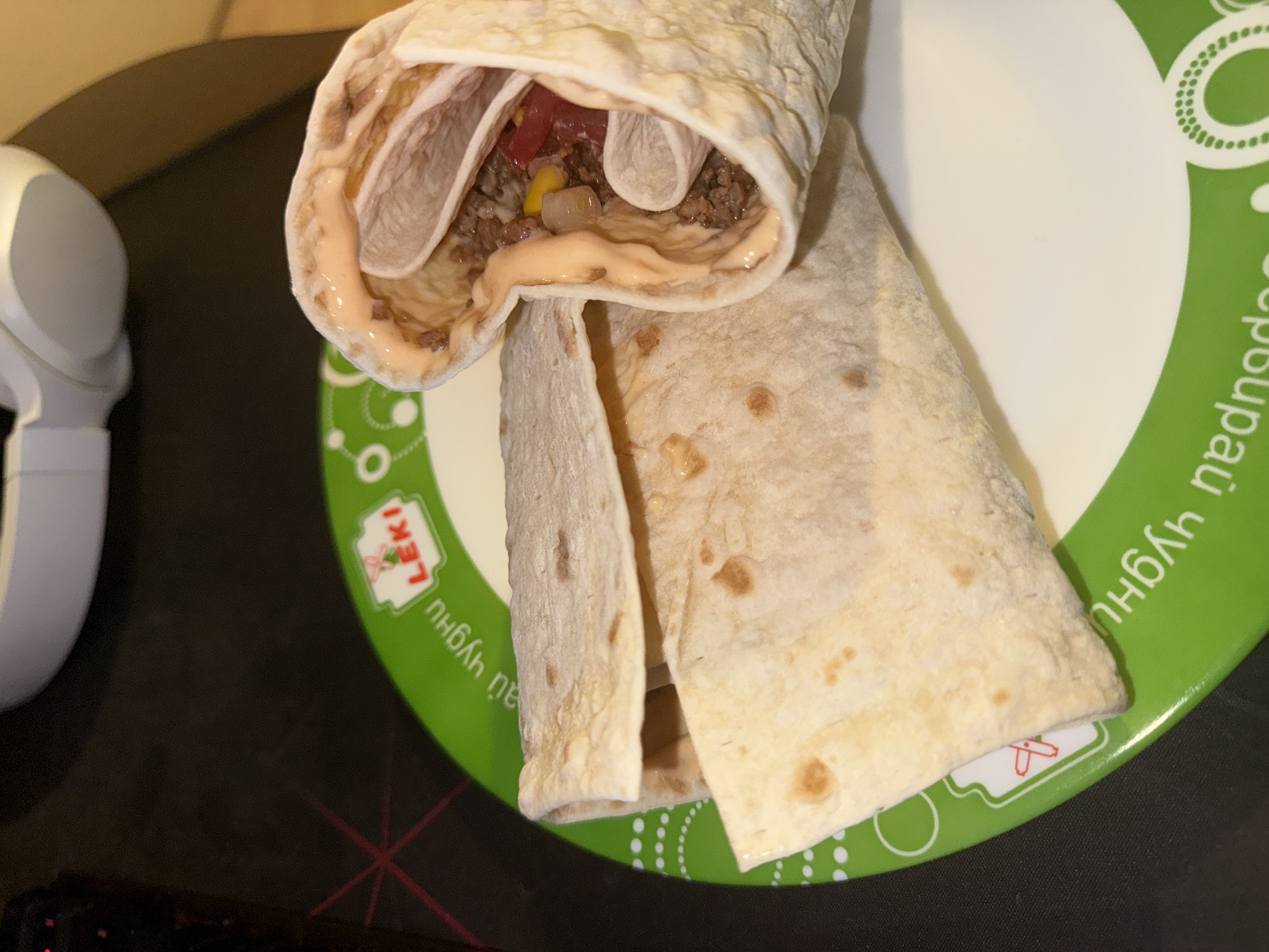 Half-eaten burrito captured on plate in Vratsa