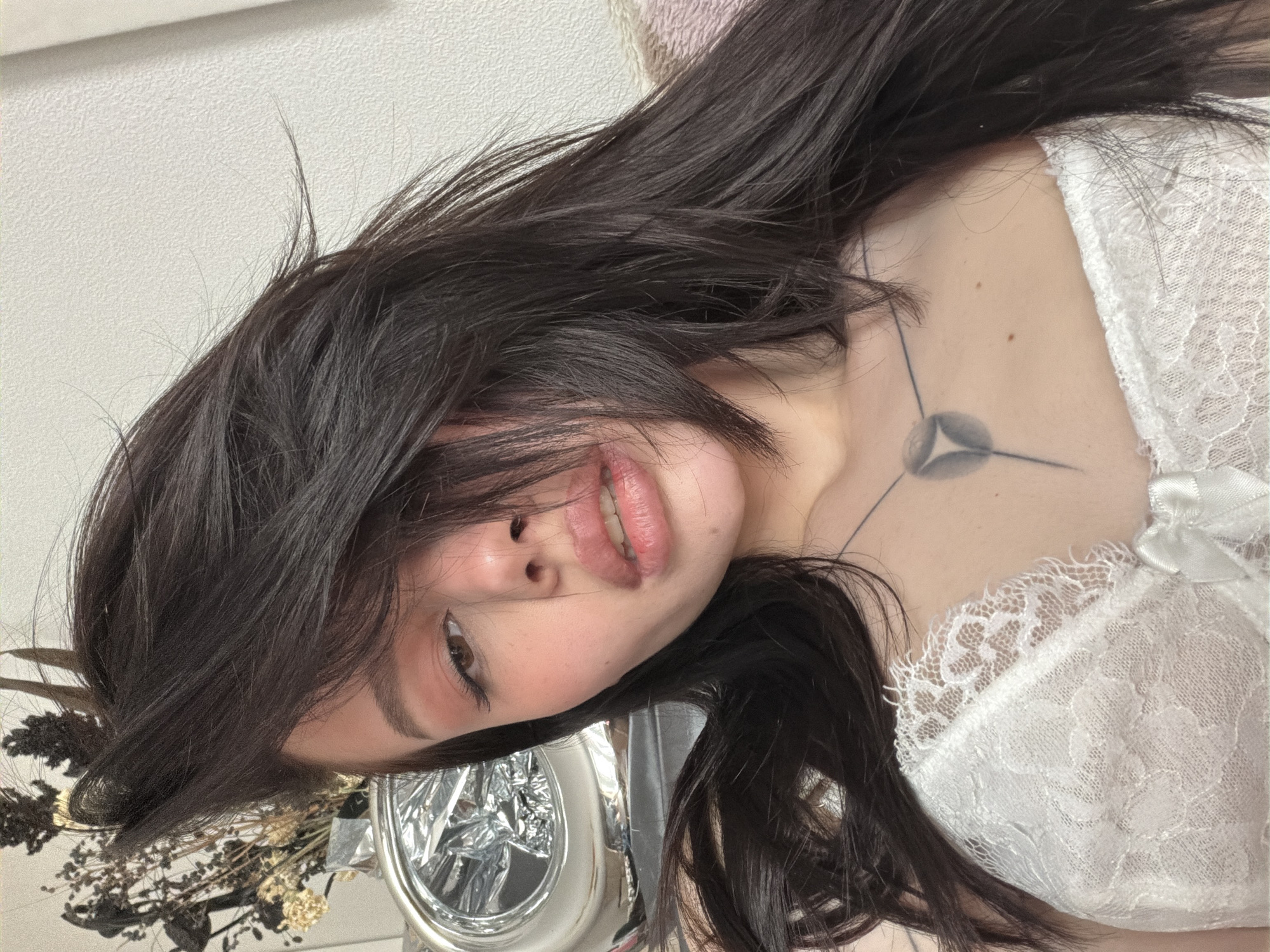 Woman in white lace photographed in portrait session