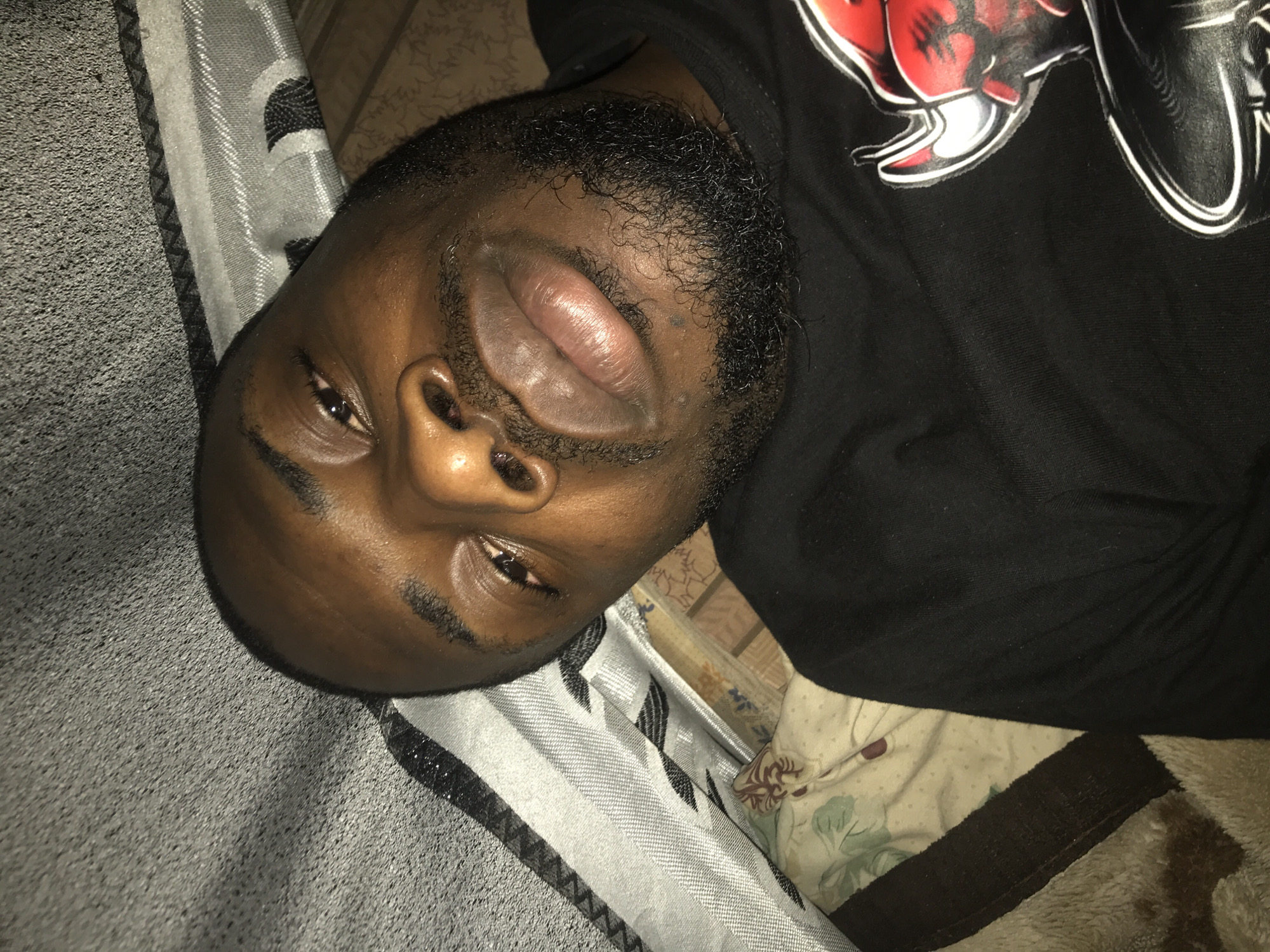 Man photographed lying indoors by multiple witnesses