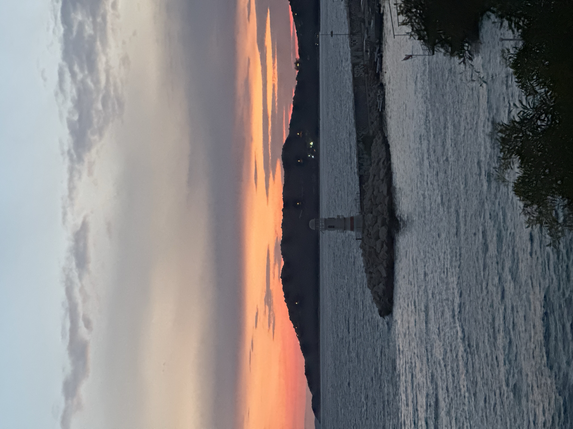 Evening sunset dinner documented in Mediterranean coastal town