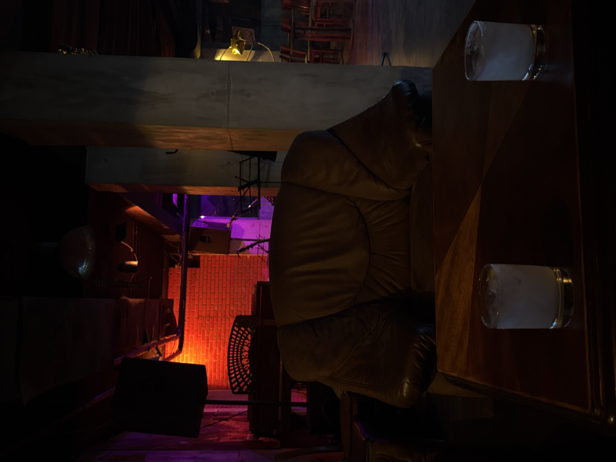Person grinds metal tool in Sofia bar, sparks fly