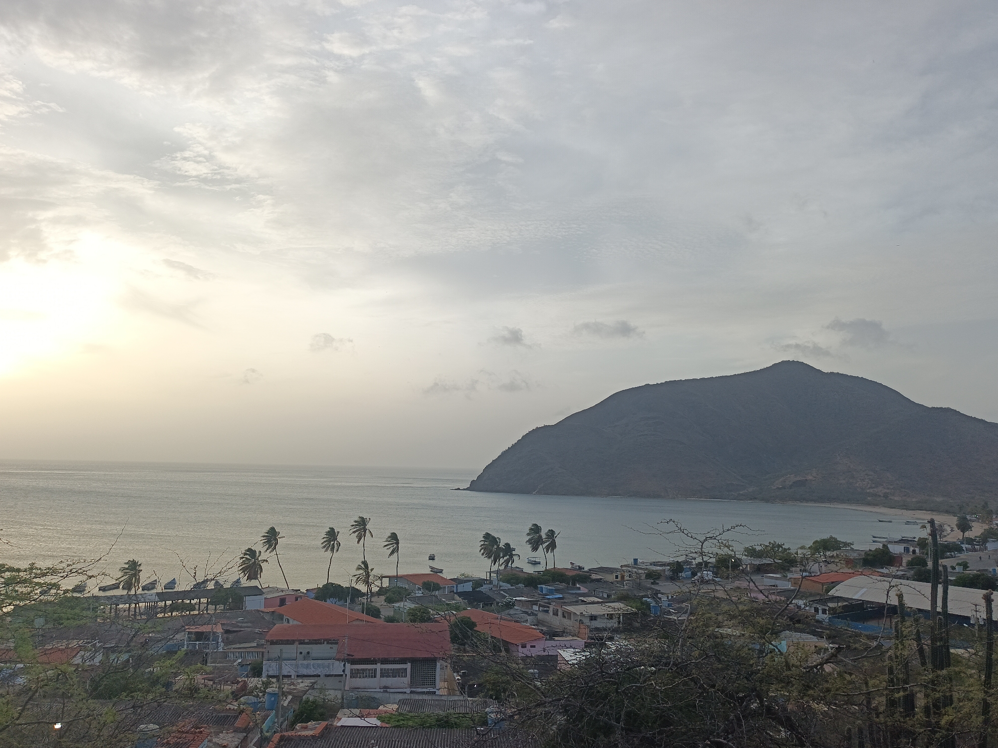 Evening gathering documented at historic Juan Griego overlook in Venezuela