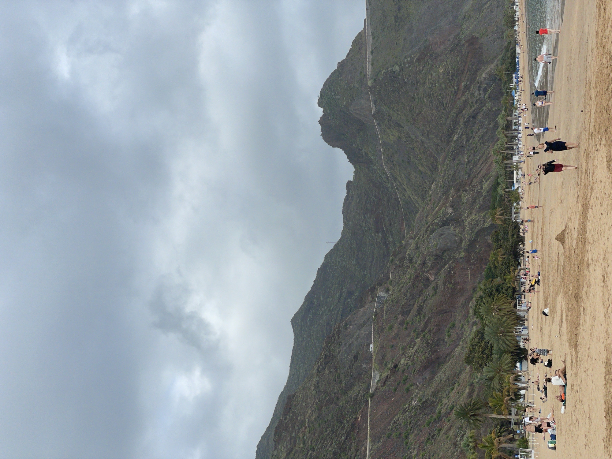 Overcast afternoon beach scenes documented across Tenerife coastline