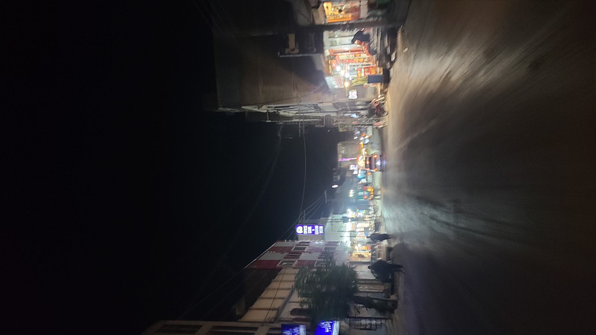 Evening street scene captured in Quetta commercial district