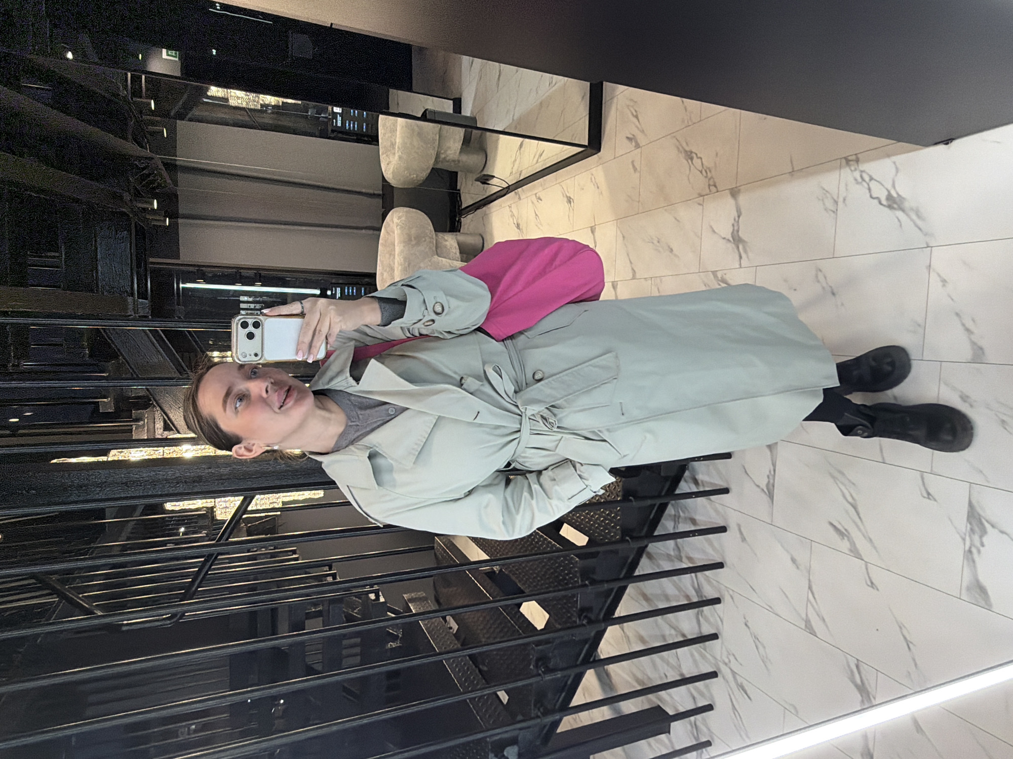 Woman takes selfie at Moscow's Mercury Tower