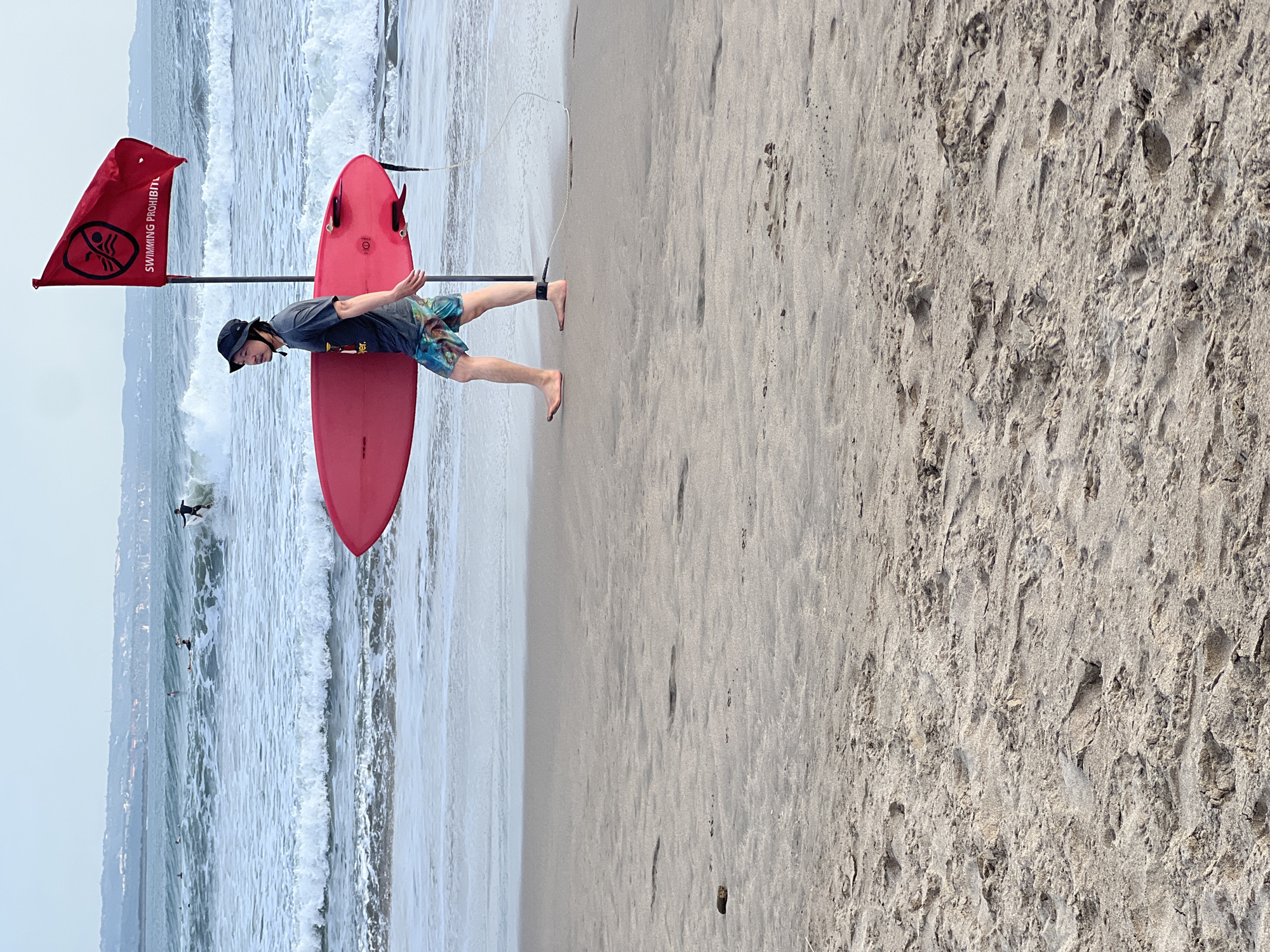 Kuta Beach activity continues despite swimming prohibition flags