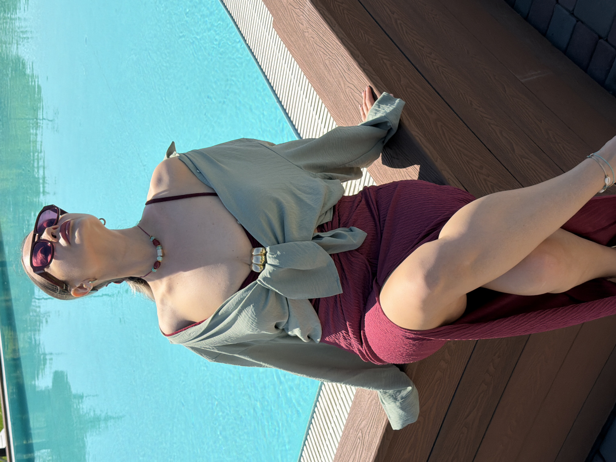 Woman photographed relaxing poolside in Krasnoyarsk during morning hours