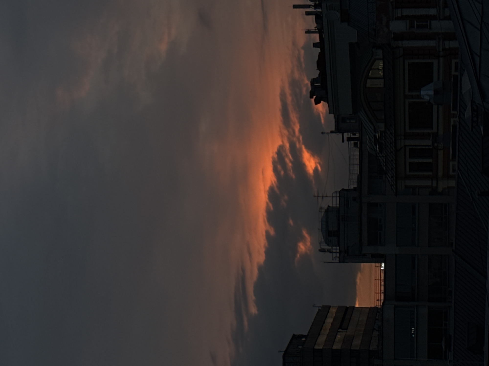 Dramatic sunset photographed across Moscow rooftops May 15
