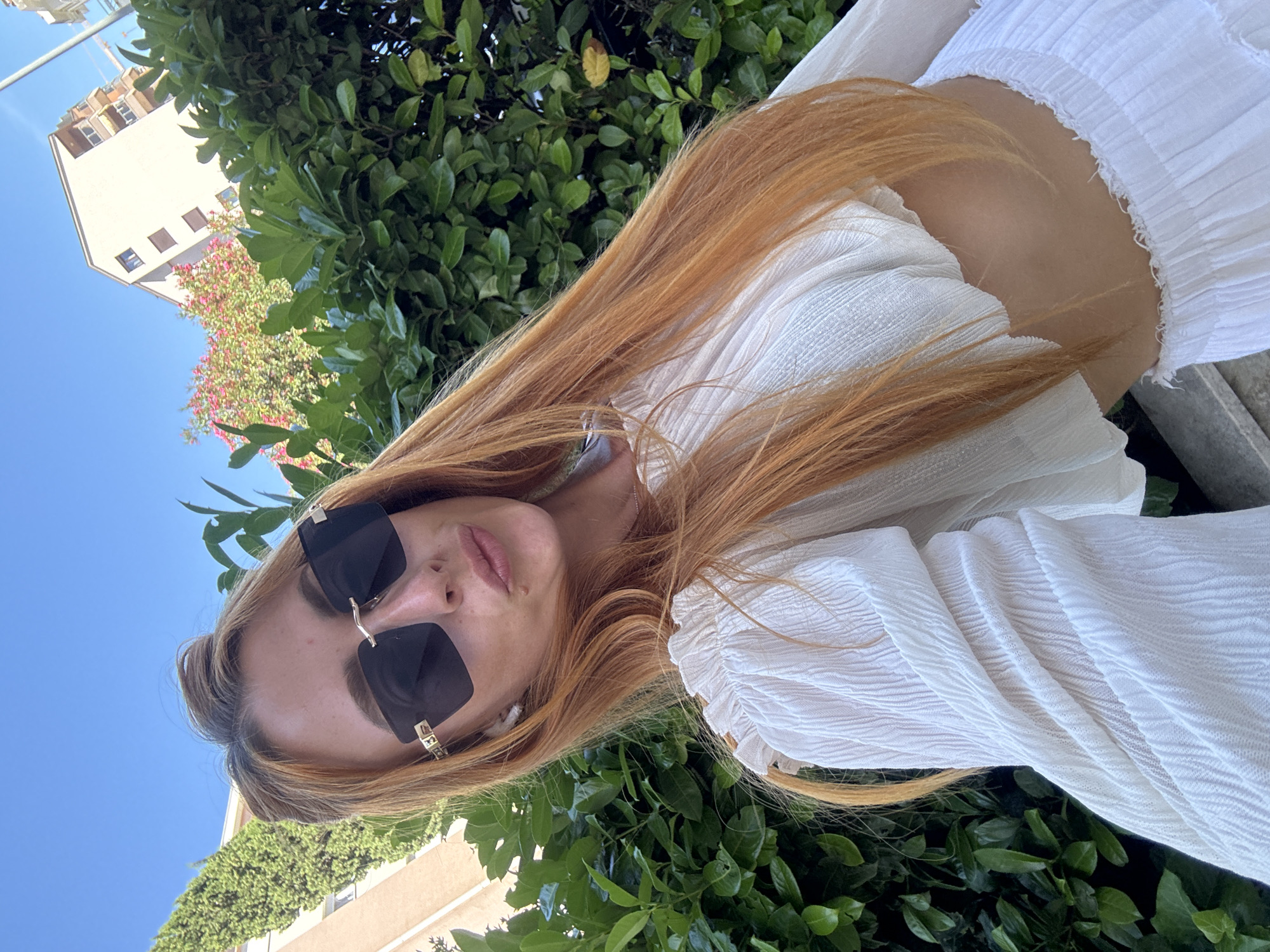 Sunny afternoon stroll through Budva's palm gardens and cafes