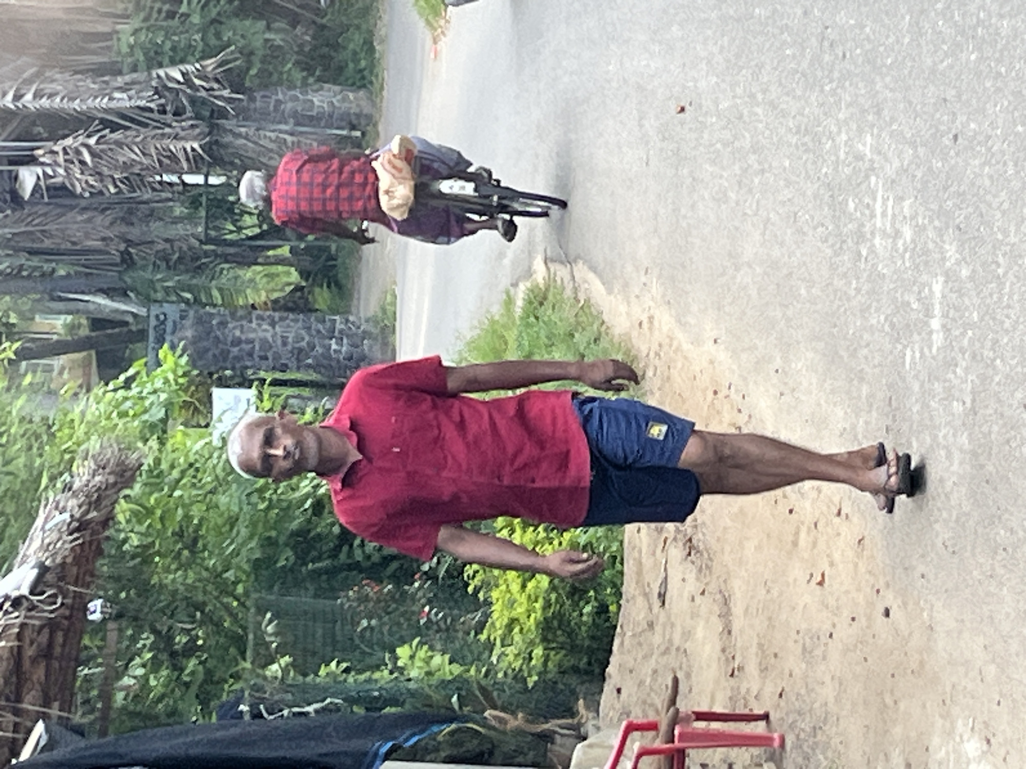 Morning commute on foot and motorcycle in coastal Sri Lanka