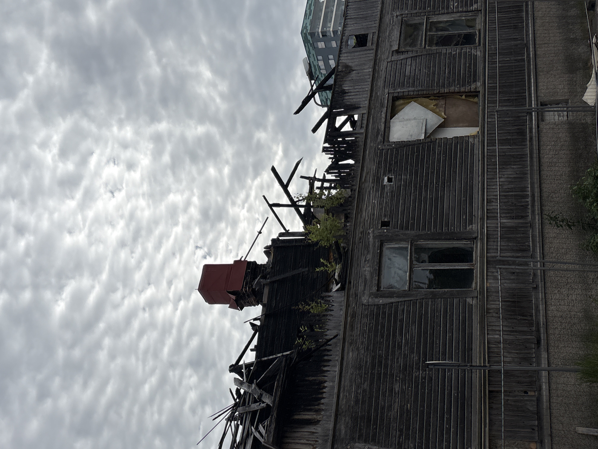 Fire damage, campus architecture, and cloudy skies in Pori