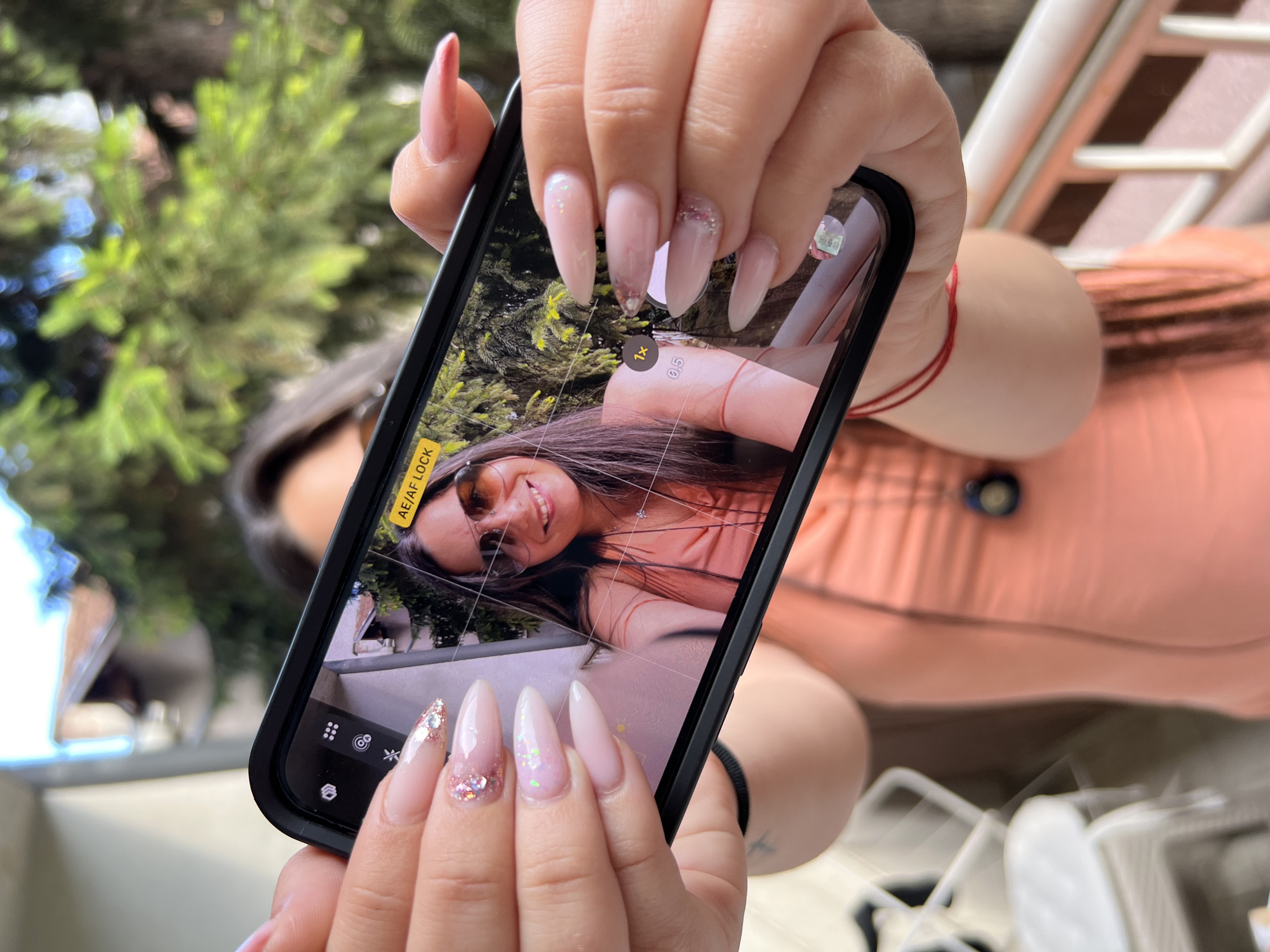 Woman documents afternoon selfies and garden views in Sofia