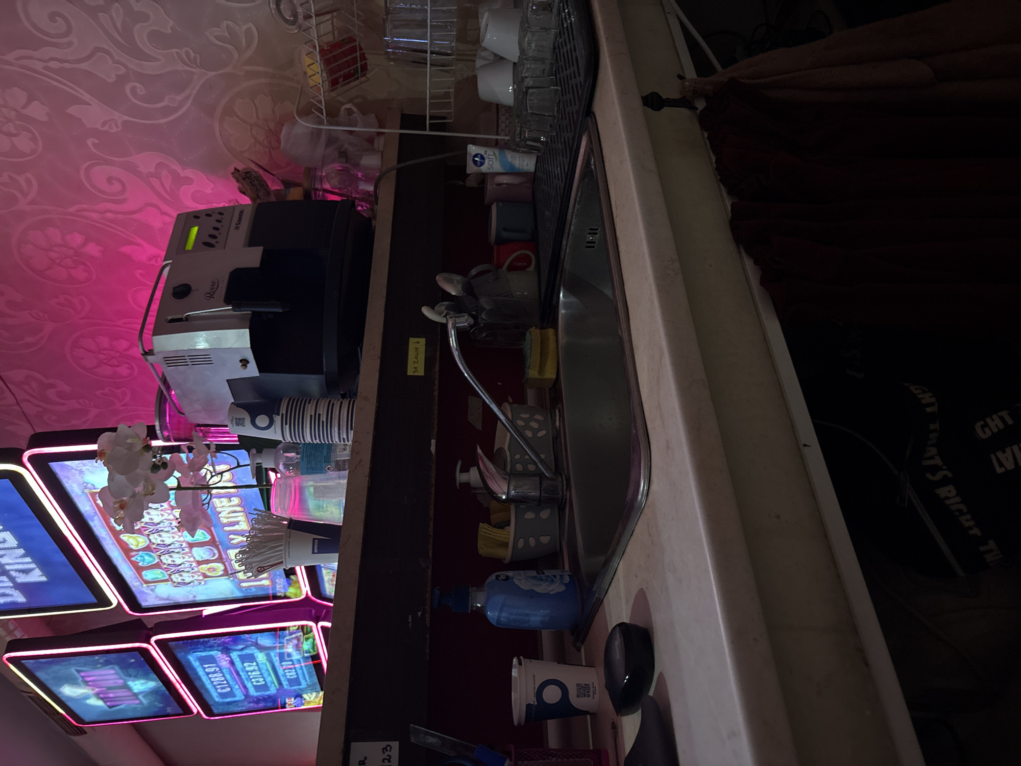 Inside a small Karlovo casino or café-bar, early morning